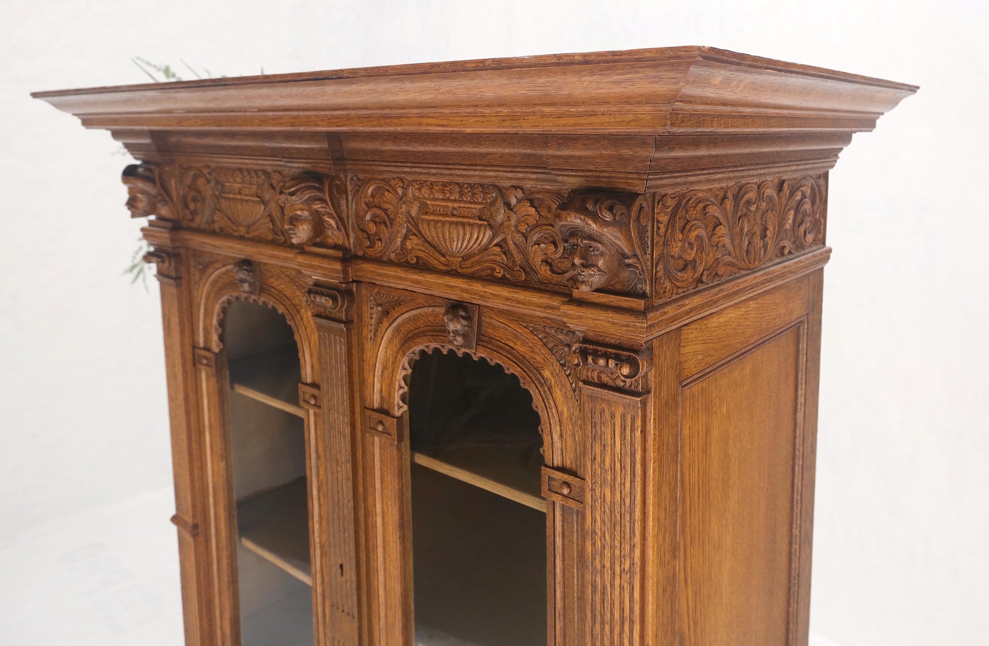 EstablishedLines Heavily Carved Oak Faces Urns Motive Two Door China Cabinet c1880s MINT!