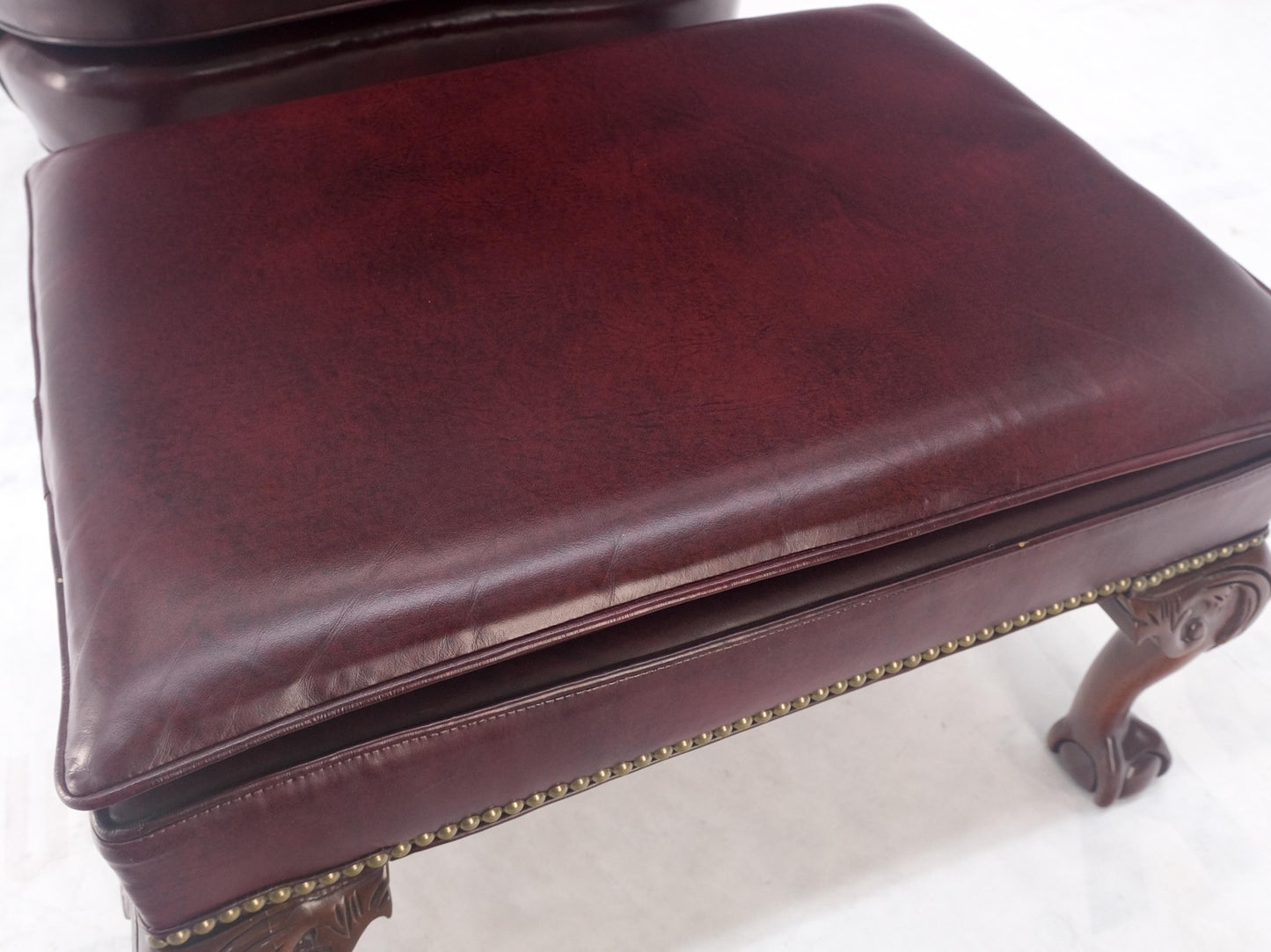 EstablishedLines Kindel Burgundy Leather Upholstery Carved Mahogany Legs Wingback Chair & Ottoman