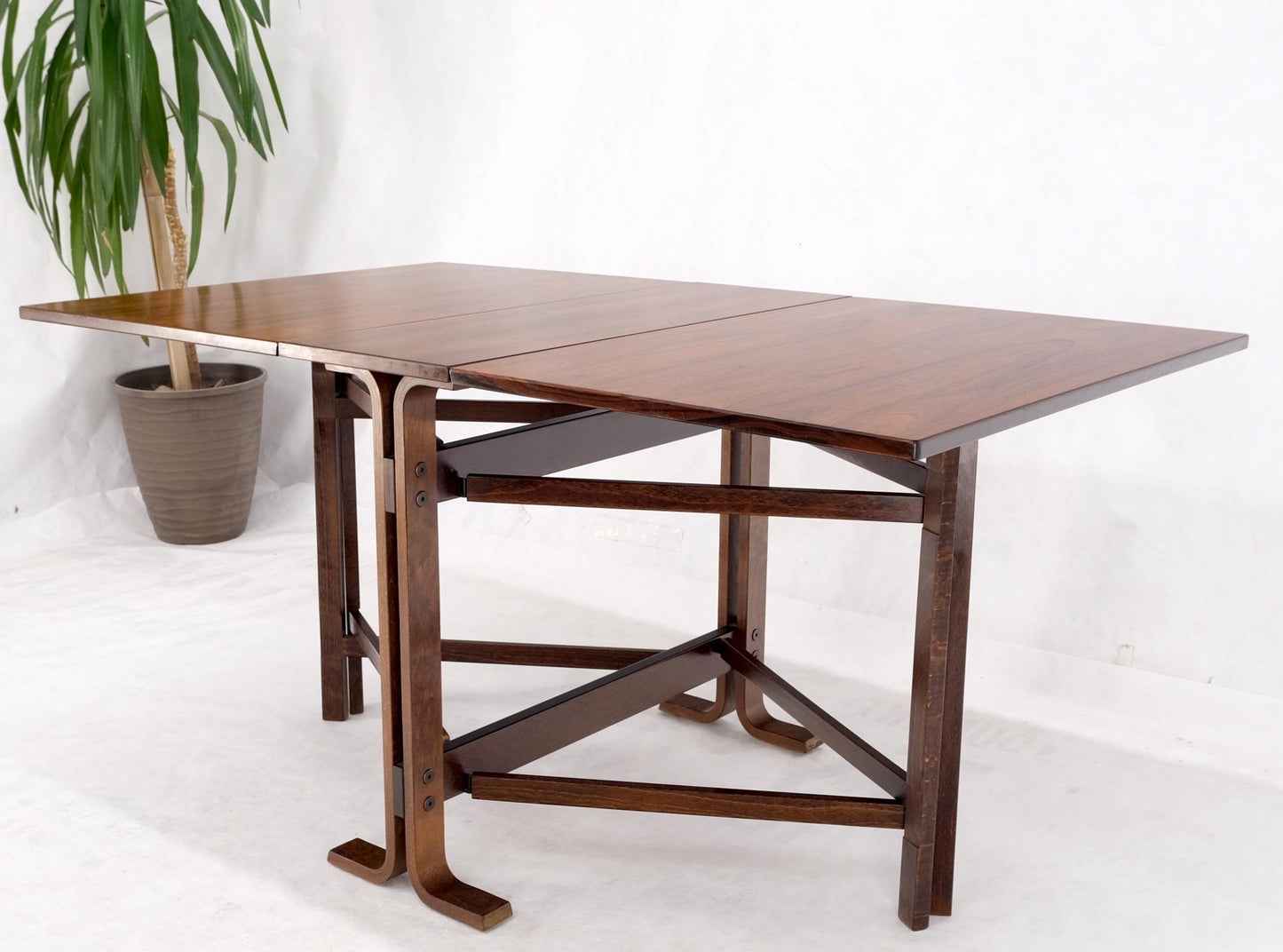EstablishedLines Made in Norway Danish Modern Bent Rosewood Plywood Legs Drop Leaf Dining Table
