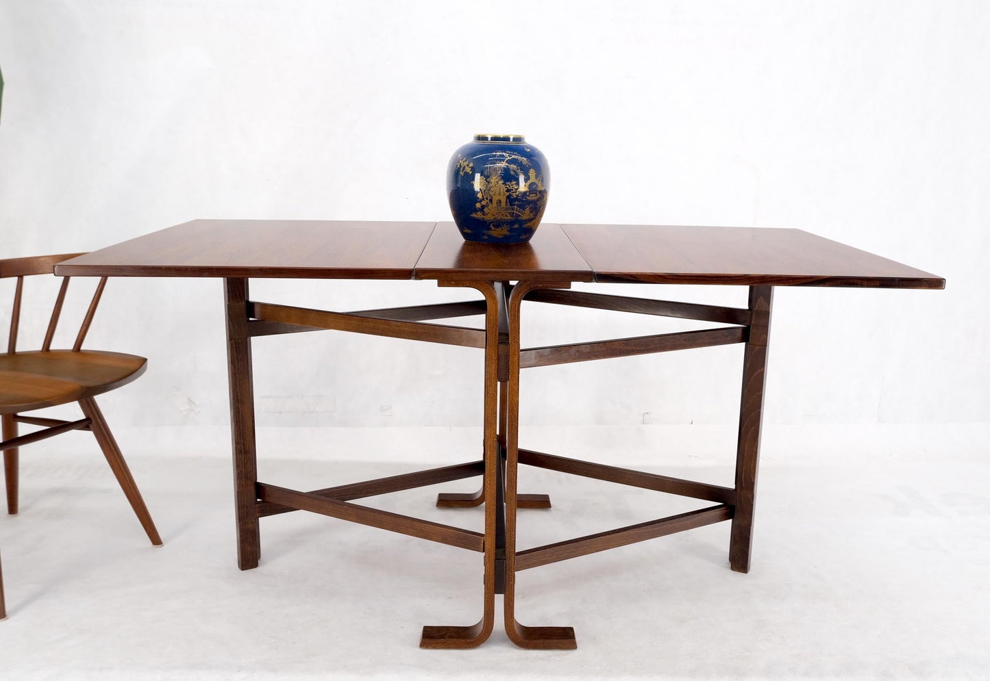 EstablishedLines Made in Norway Danish Modern Bent Rosewood Plywood Legs Drop Leaf Dining Table