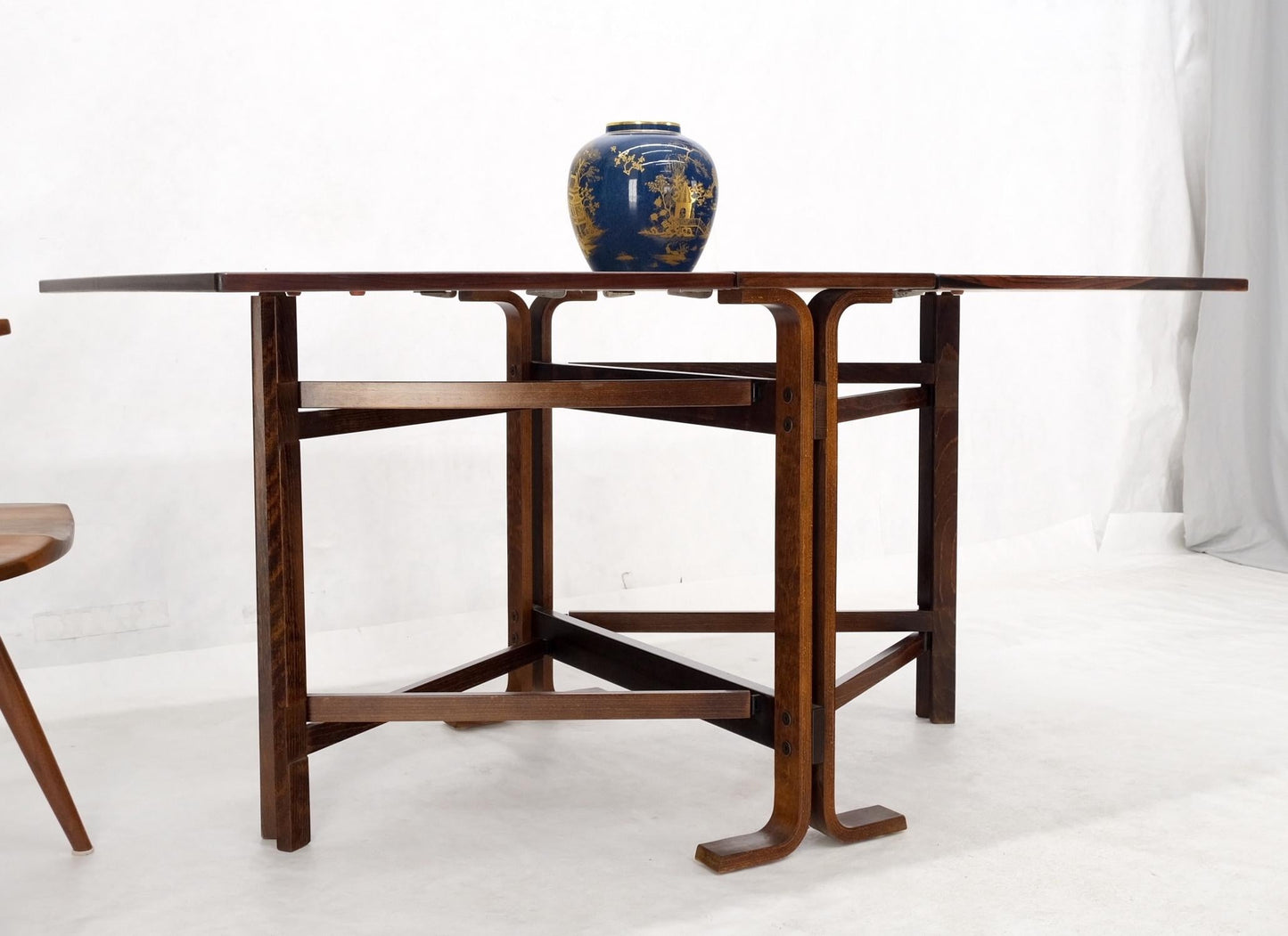EstablishedLines Made in Norway Danish Modern Bent Rosewood Plywood Legs Drop Leaf Dining Table