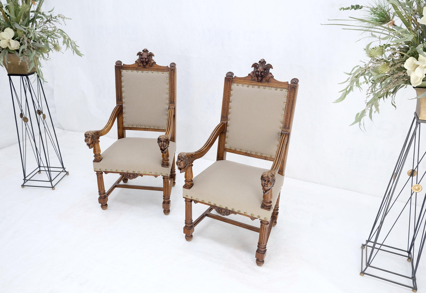 EstablishedLines Pair Antique Heavily Carved Walnut Cherub North Wind Faces Arm Chairs New Uphols