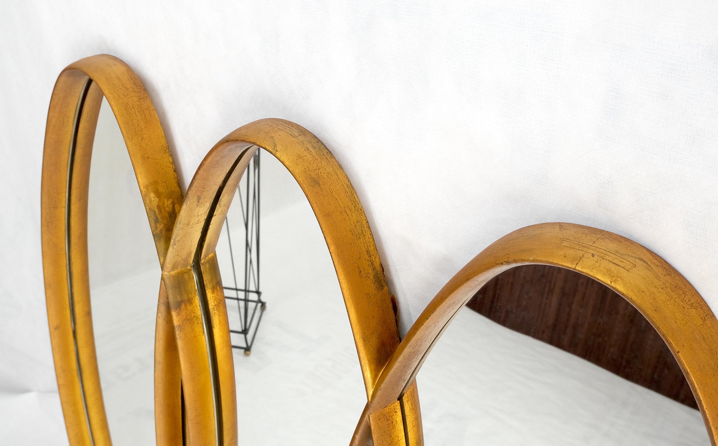 EstablishedLines Mid-Century Modern Tripple Overlapping Carved Wood Ovals Gold Gilt Wall Mirror