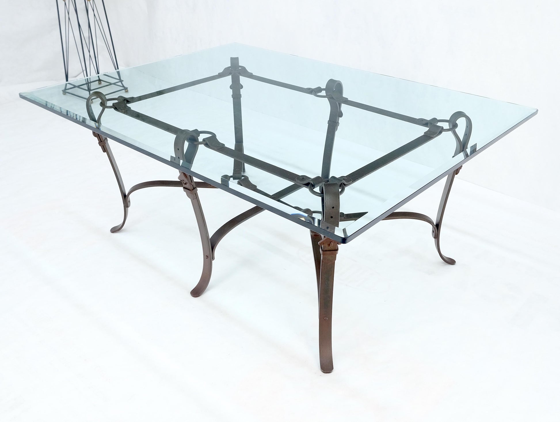 EstablishedLines Wrought Iron Faux Belts Rinded Together Base 3/4" Glass Top Large Coffee Table