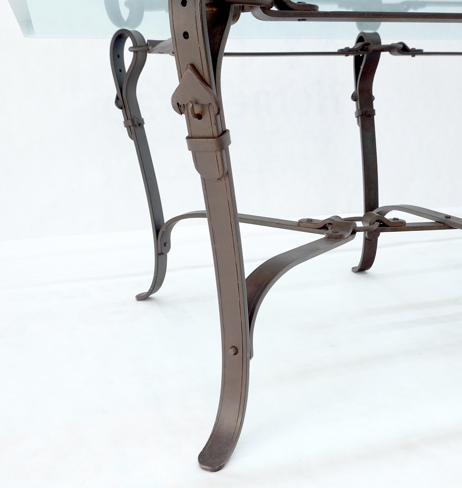 EstablishedLines Wrought Iron Faux Belts Rinded Together Base 3/4" Glass Top Large Coffee Table