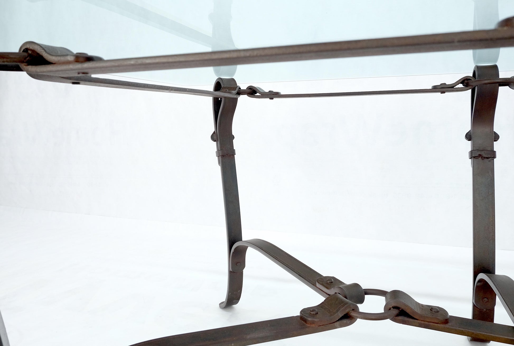 EstablishedLines Wrought Iron Faux Belts Rinded Together Base 3/4" Glass Top Large Coffee Table