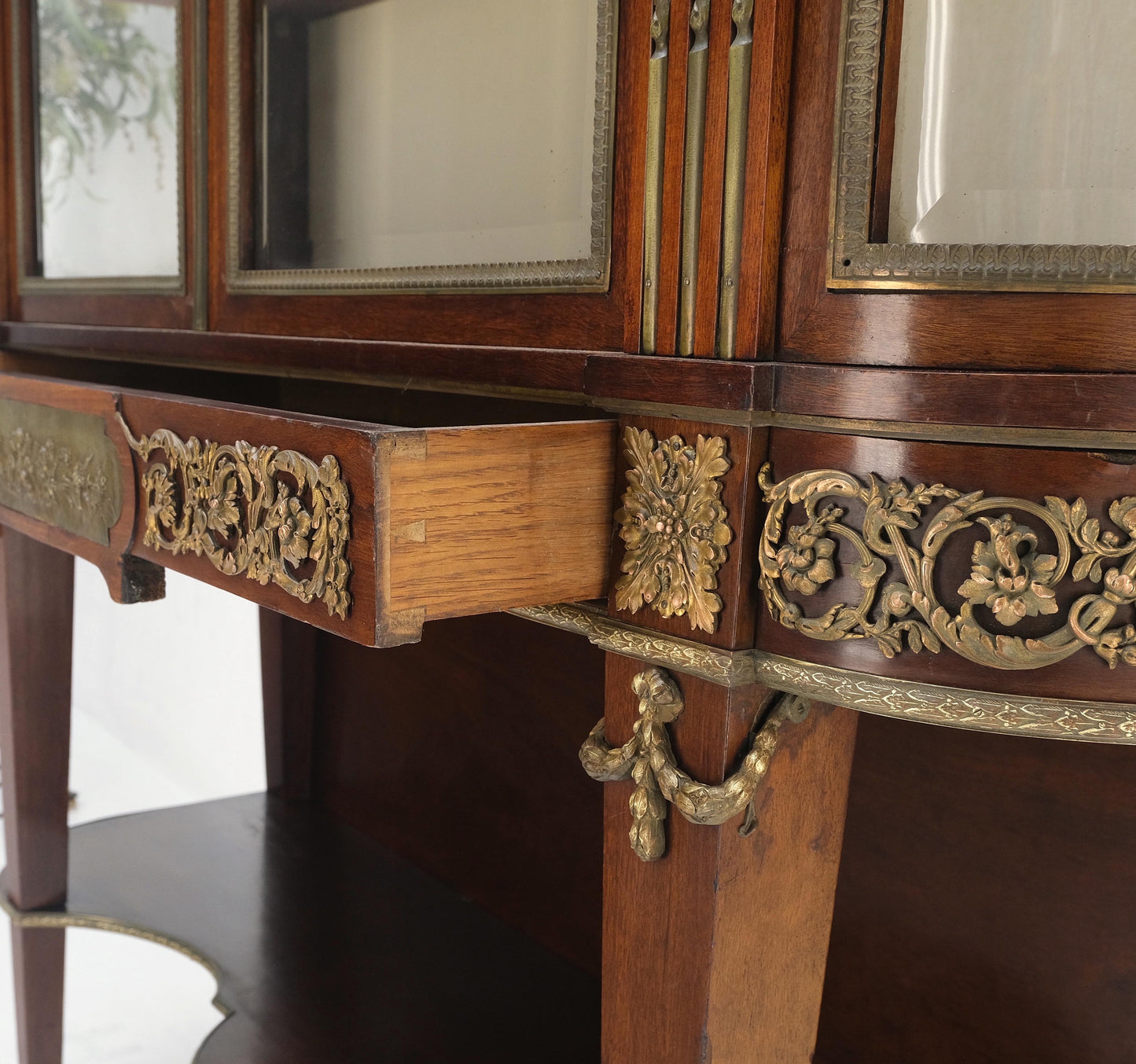 EstablishedLines Late 19th Century Gilt Bronze Mounted Ormolu Vitrine Cubboard Curved Glass