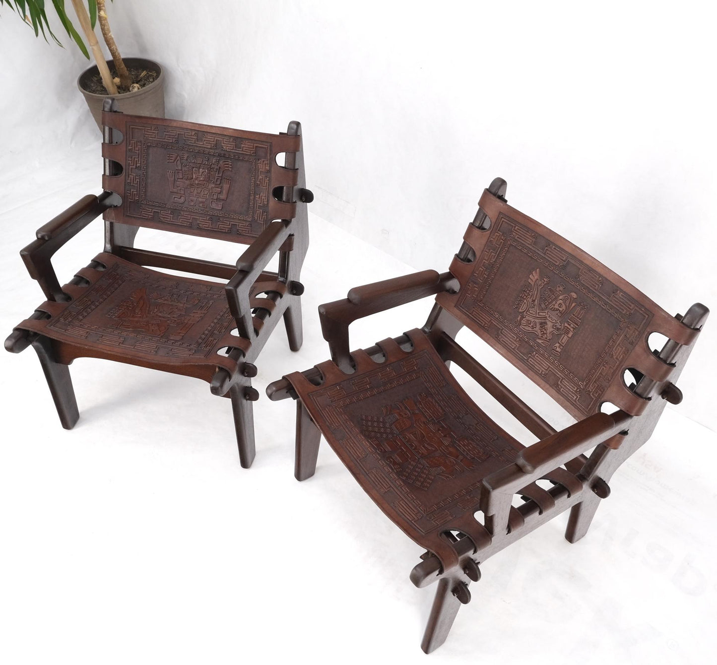 EstablishedLines Pair of Walnut Carved Tolled Leather Sling Seats Arm Chairs by Angel Pazmino