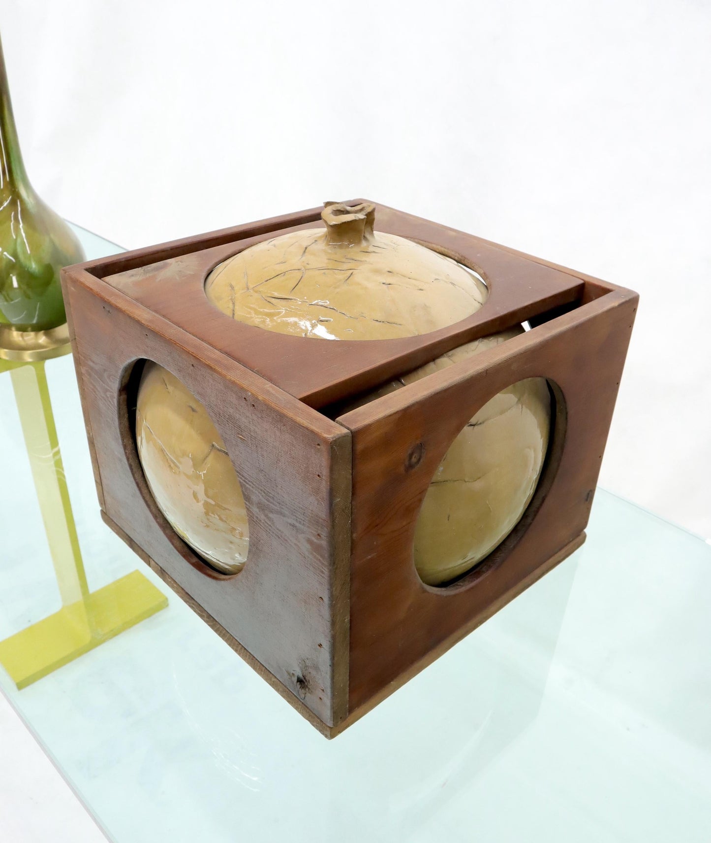 EstablishedLines Mid-Century Modern Sculpture of a Ceramic Sphere Ball Incased into Wooden Crate