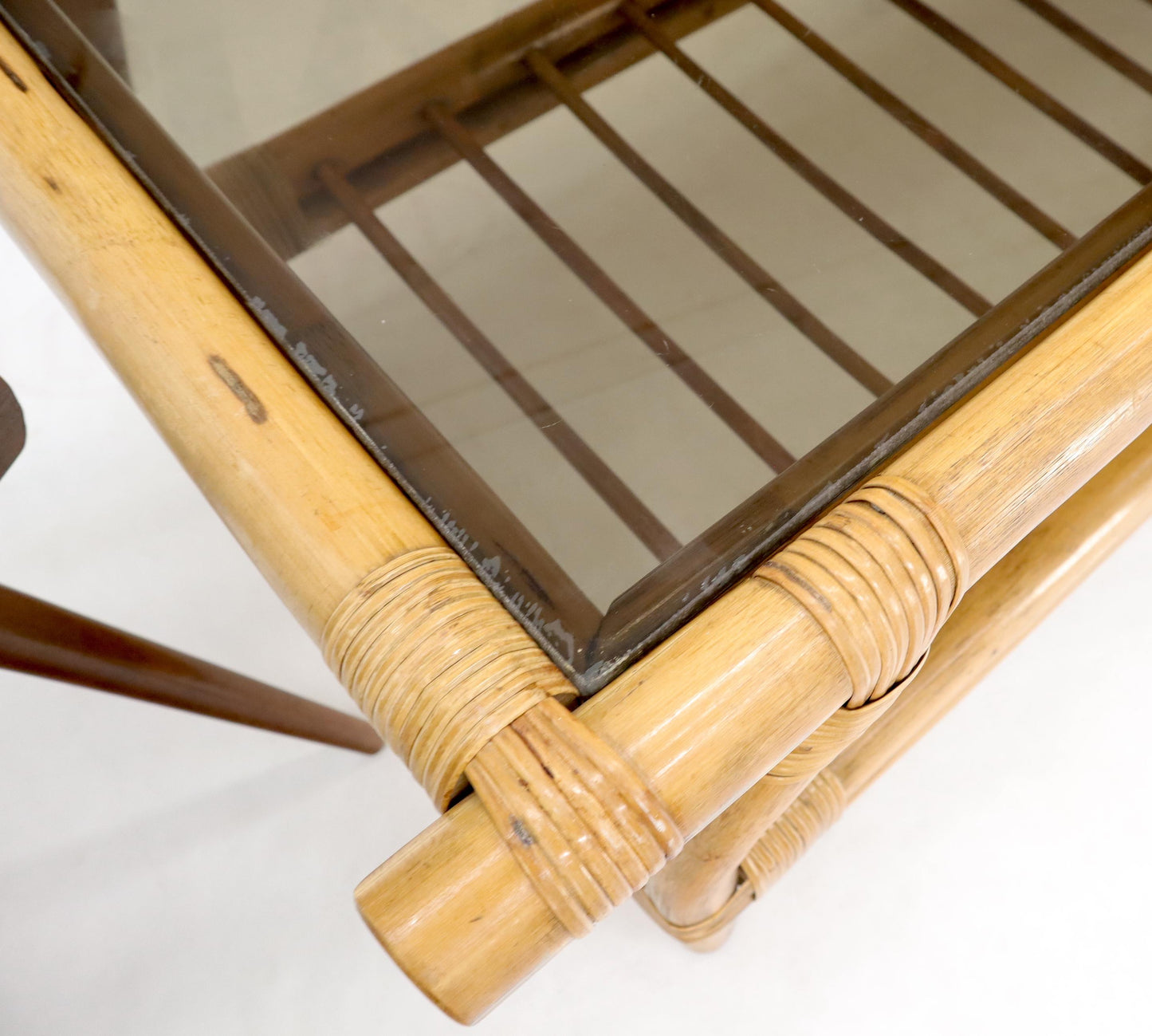 EstablishedLines Bamboo Rattan Rectangular Smoked Glass Top Coffee Table with Dowel Bottom Shelf