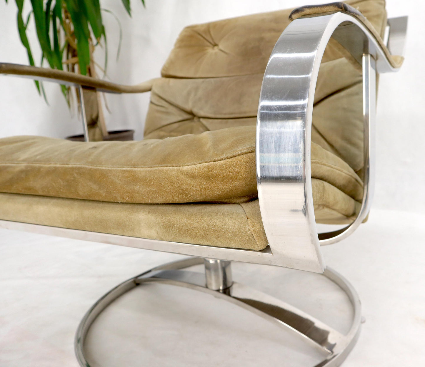 EstablishedLines Heavy Gage Polished Stainless Steel Swivel Base Suede Upholstery Lounge Chair