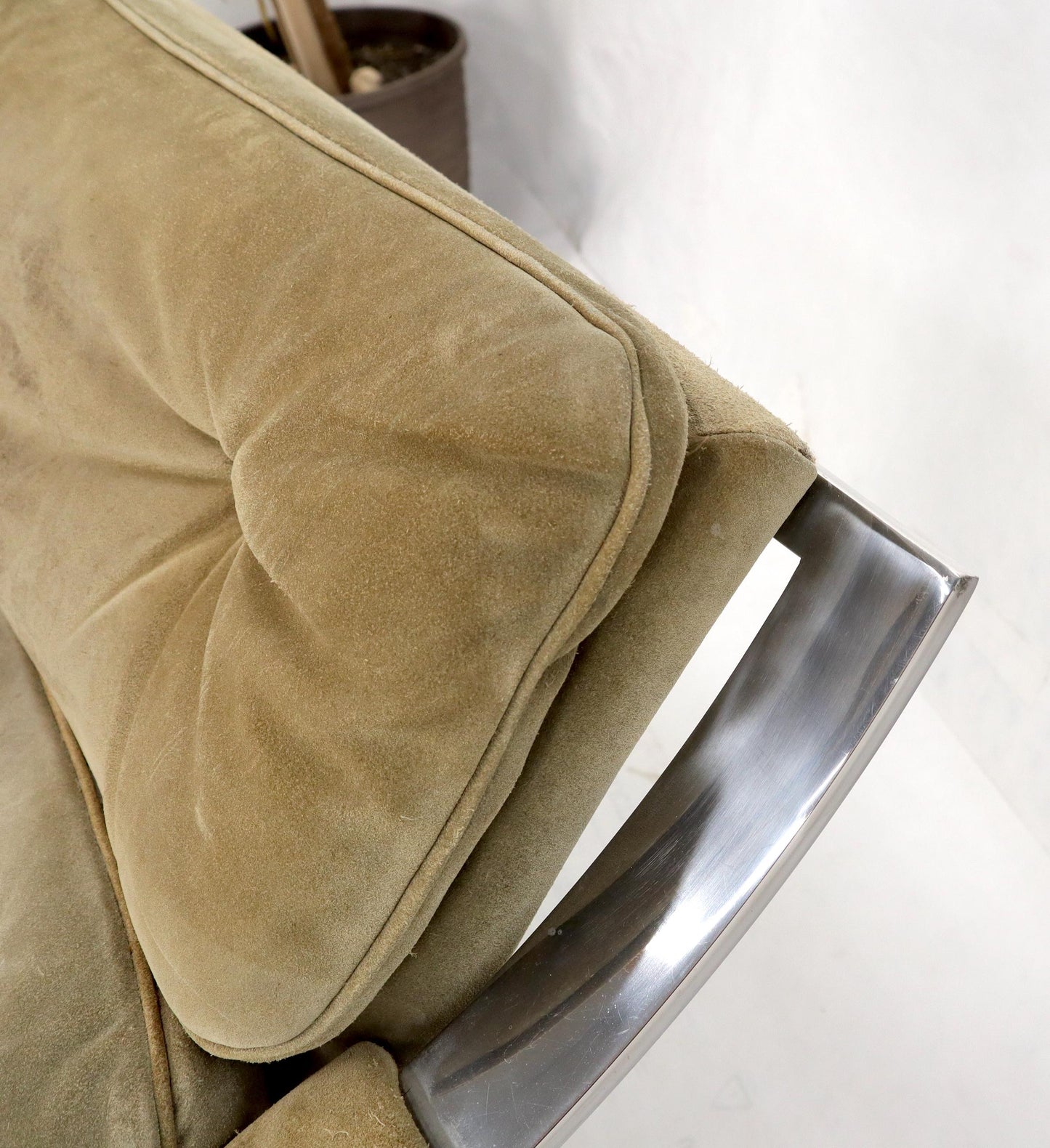 EstablishedLines Heavy Gage Polished Stainless Steel Swivel Base Suede Upholstery Lounge Chair