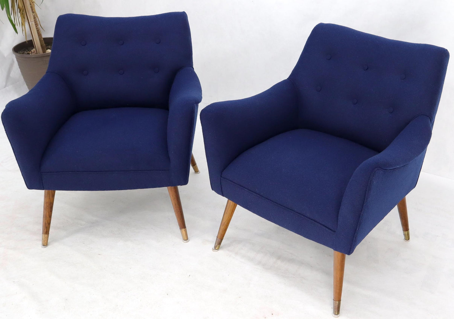 EstablishedLines Pair of Navy Blue Mid-Century Modern Lounge Arm Chairs on Tapered Dowel Legs