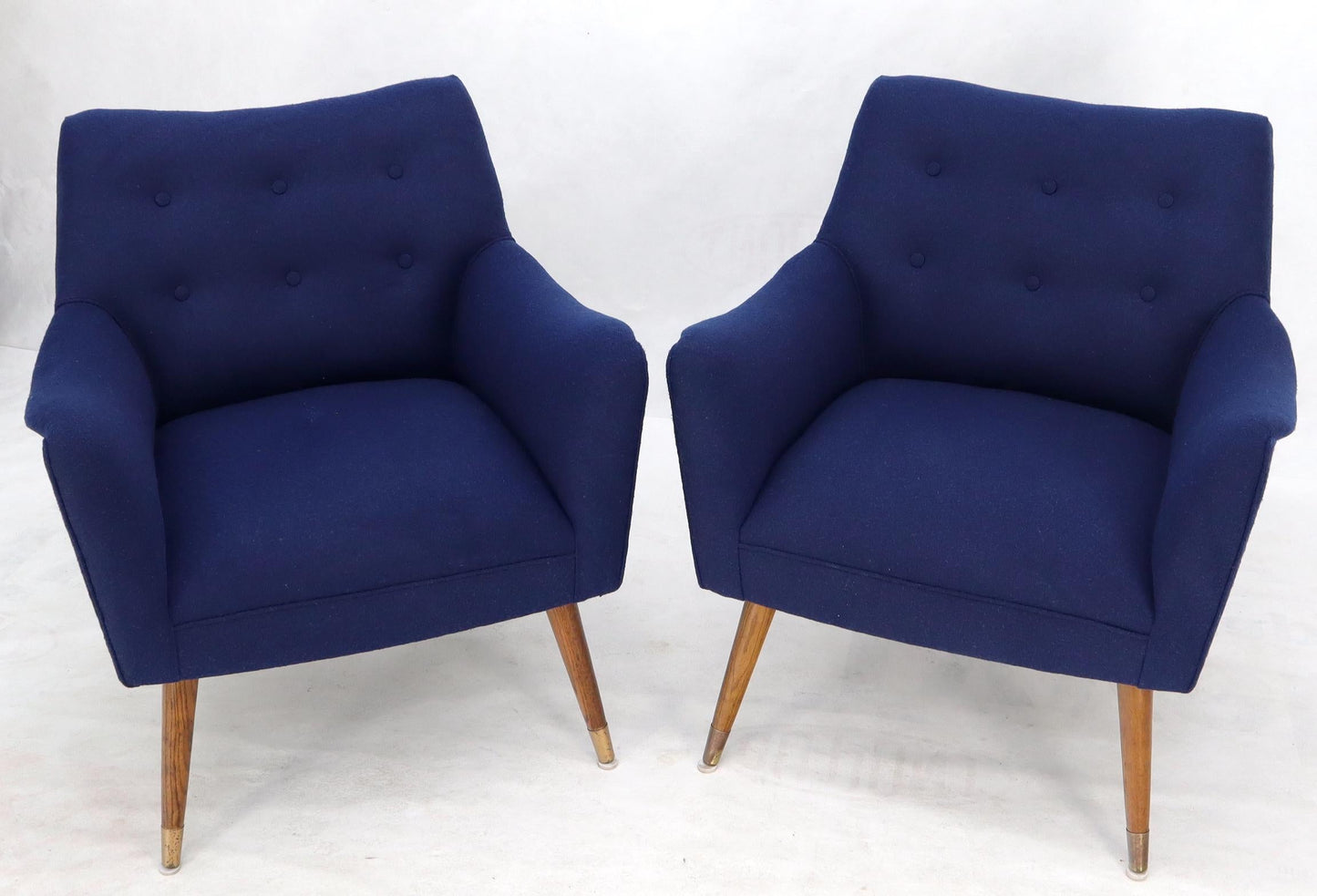 EstablishedLines Pair of Navy Blue Mid-Century Modern Lounge Arm Chairs on Tapered Dowel Legs