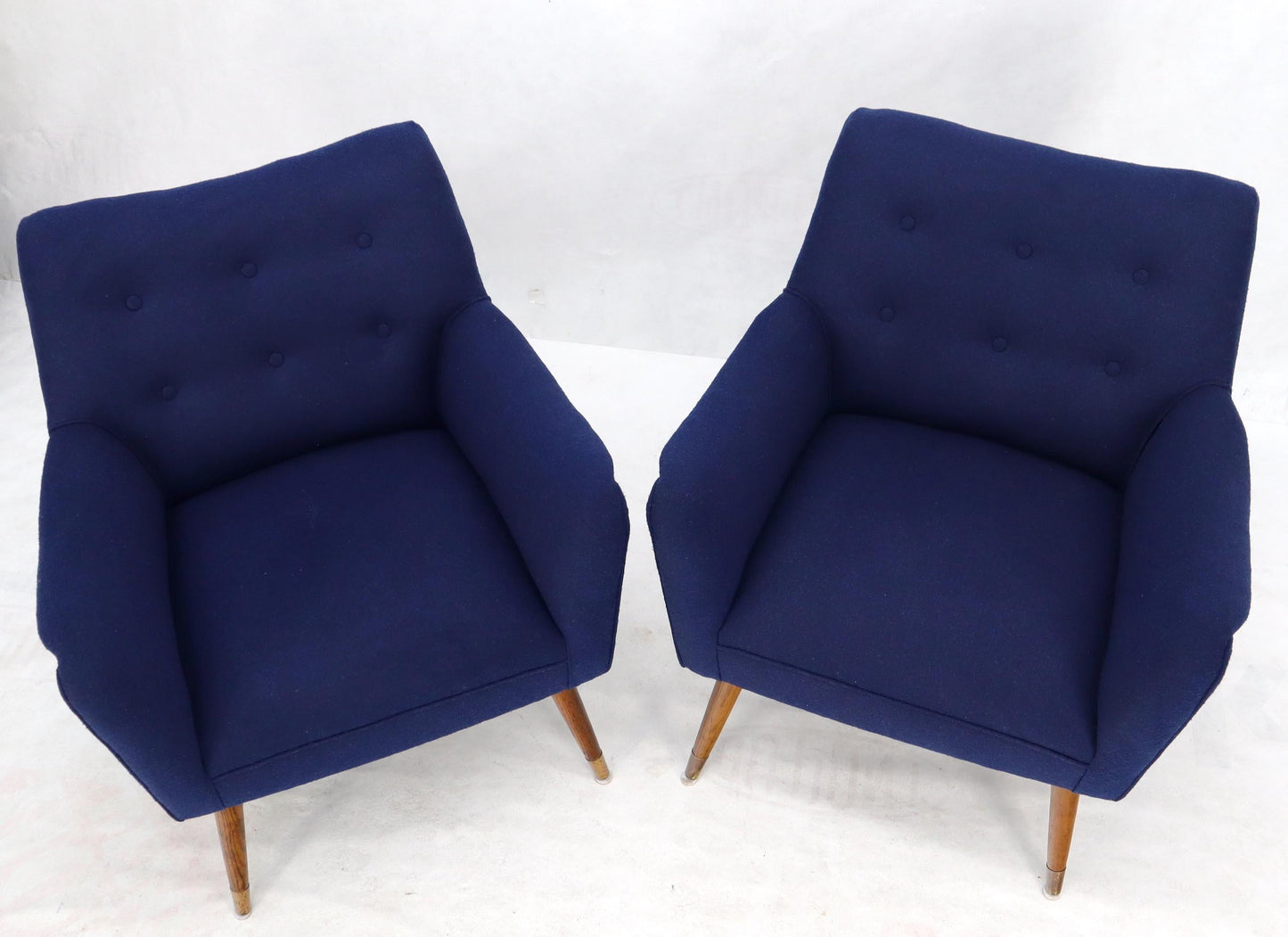 EstablishedLines Pair of Navy Blue Mid-Century Modern Lounge Arm Chairs on Tapered Dowel Legs