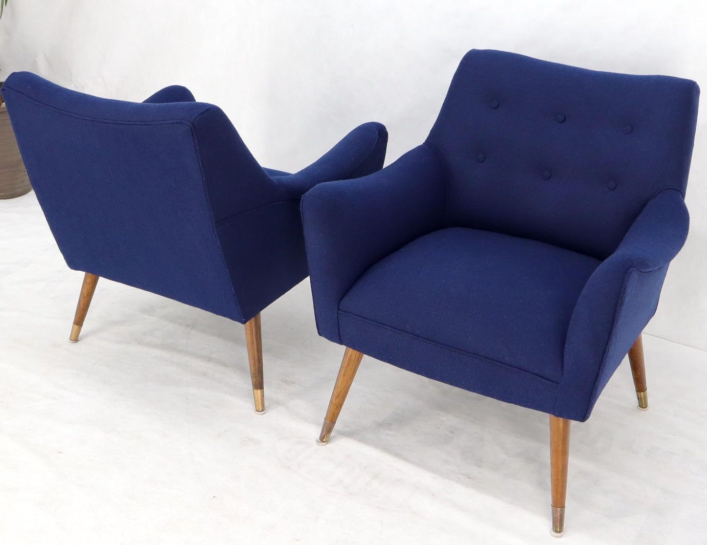 EstablishedLines Pair of Navy Blue Mid-Century Modern Lounge Arm Chairs on Tapered Dowel Legs
