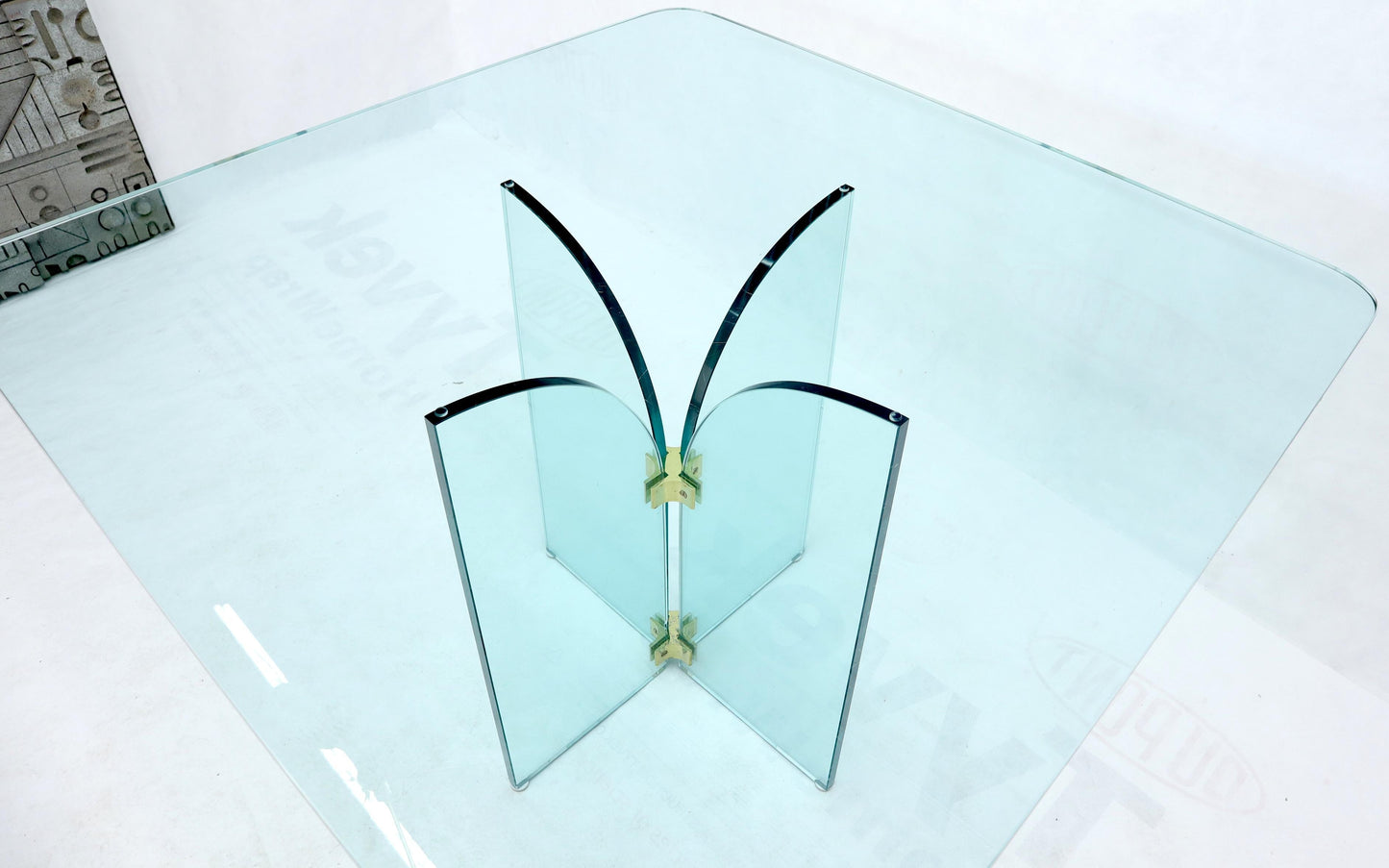 EstablishedLines Thick Rounded Square Glass Top Dining Table on Thick Glass Pedestal Base