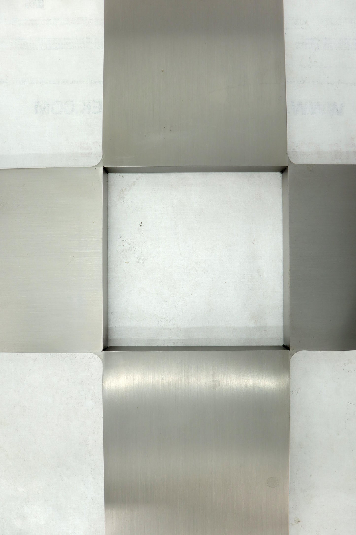 EstablishedLines Phenomenal 1" Thick Bent Stainless Steel Square Coffee Table Glass Top