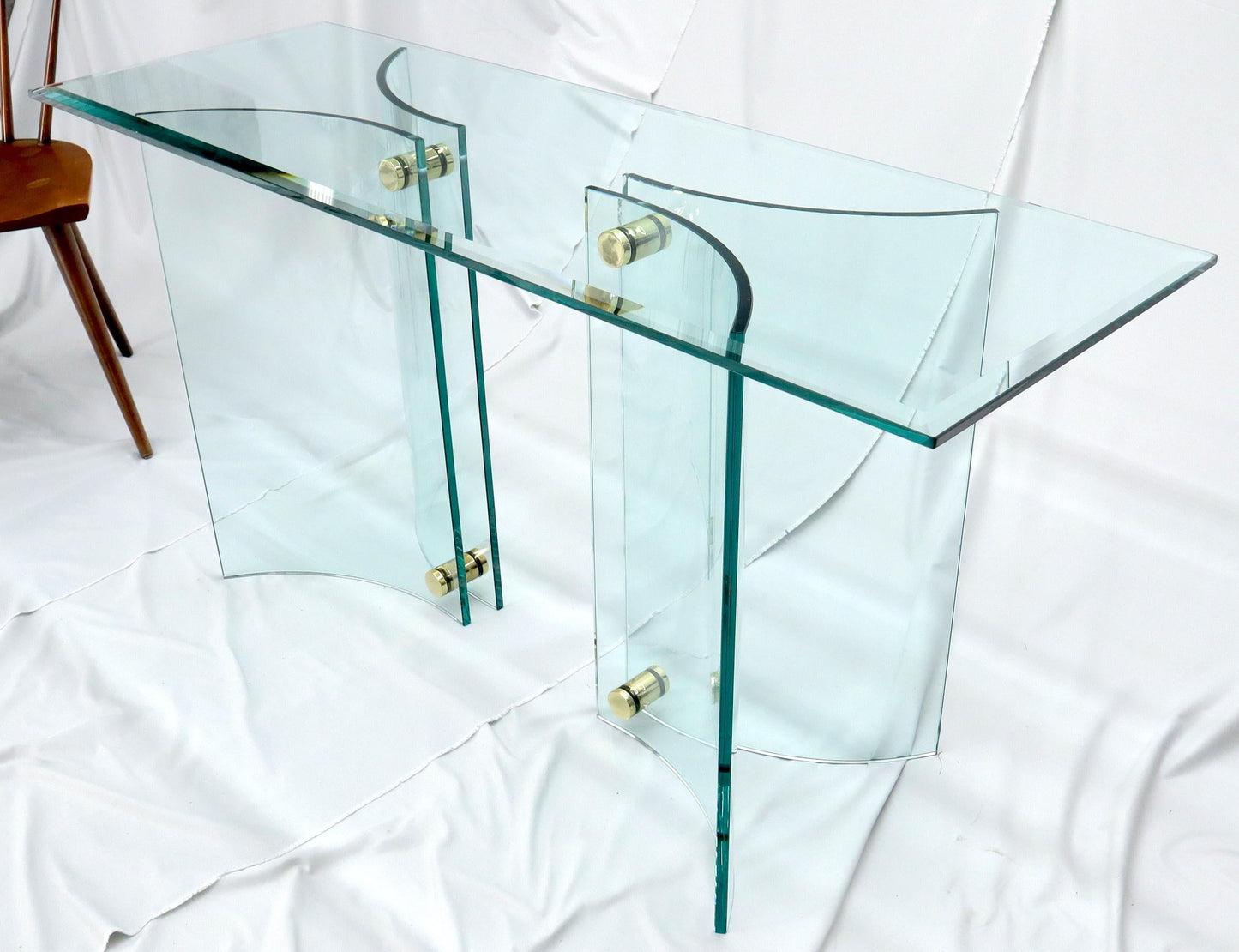 EstablishedLines Curved Glass Base Glass Top Brass Stretchers Console Table