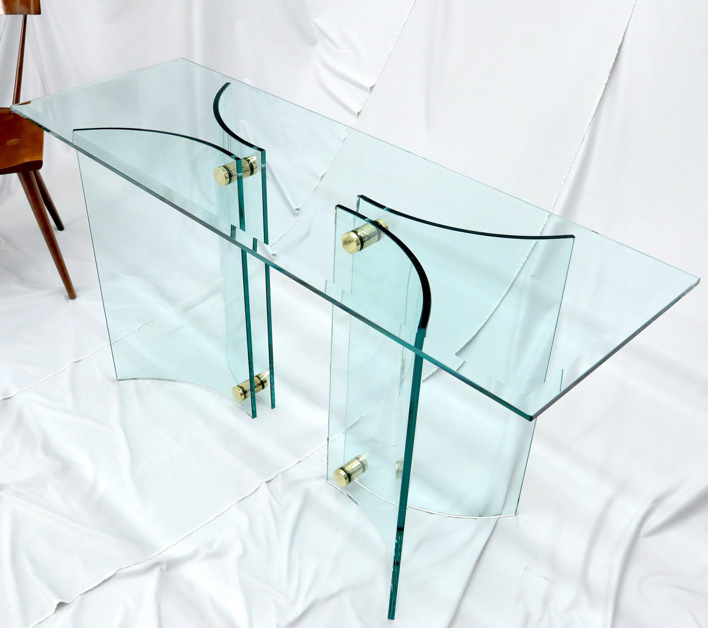 EstablishedLines Curved Glass Base Glass Top Brass Stretchers Console Table