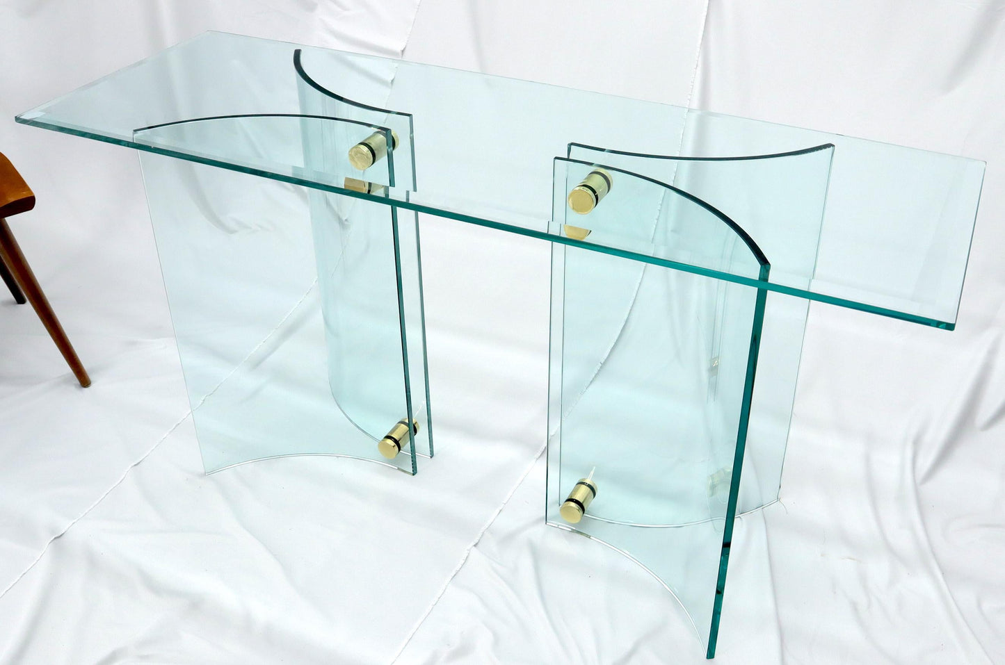 EstablishedLines Curved Glass Base Glass Top Brass Stretchers Console Table