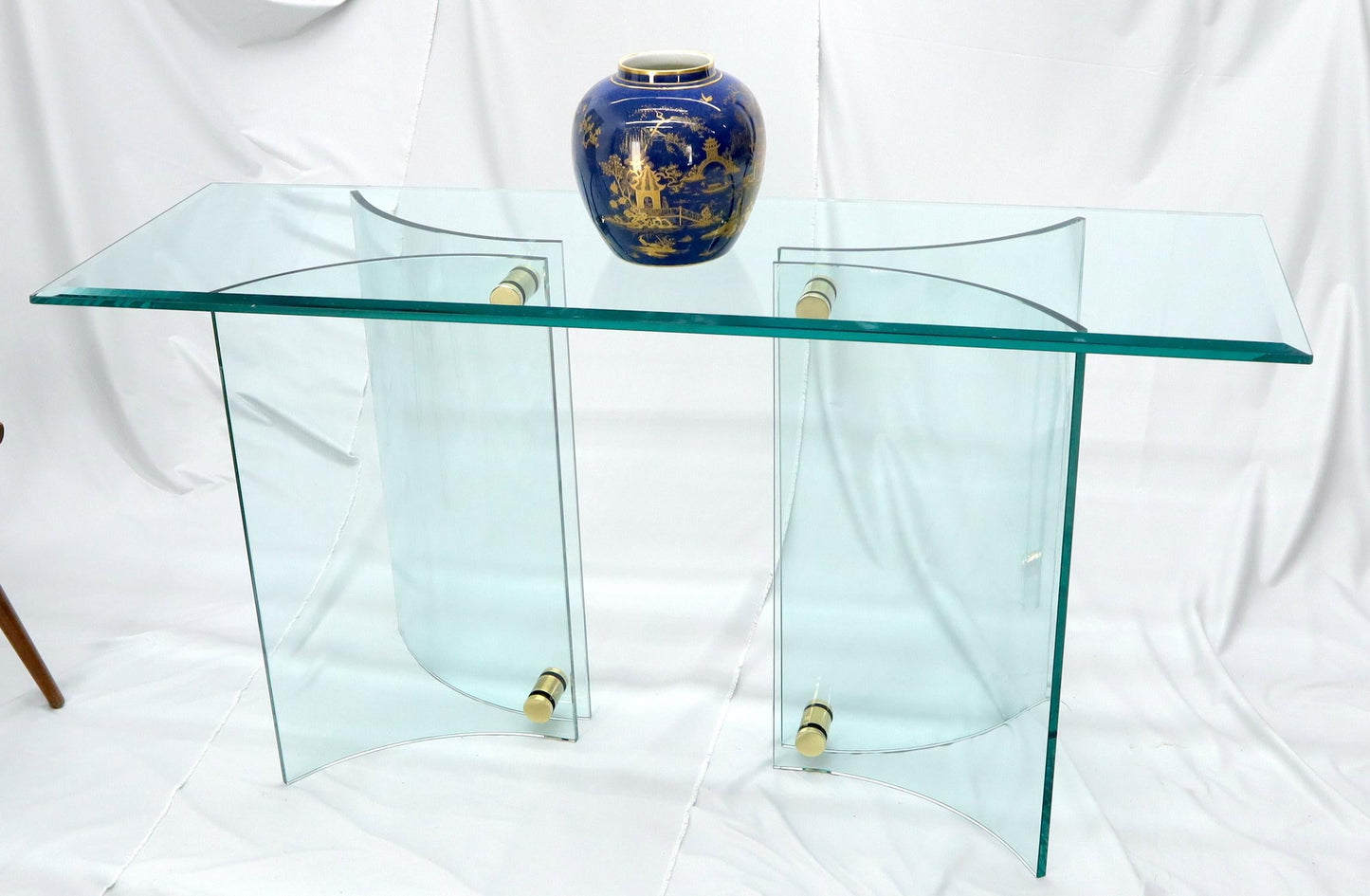 EstablishedLines Curved Glass Base Glass Top Brass Stretchers Console Table