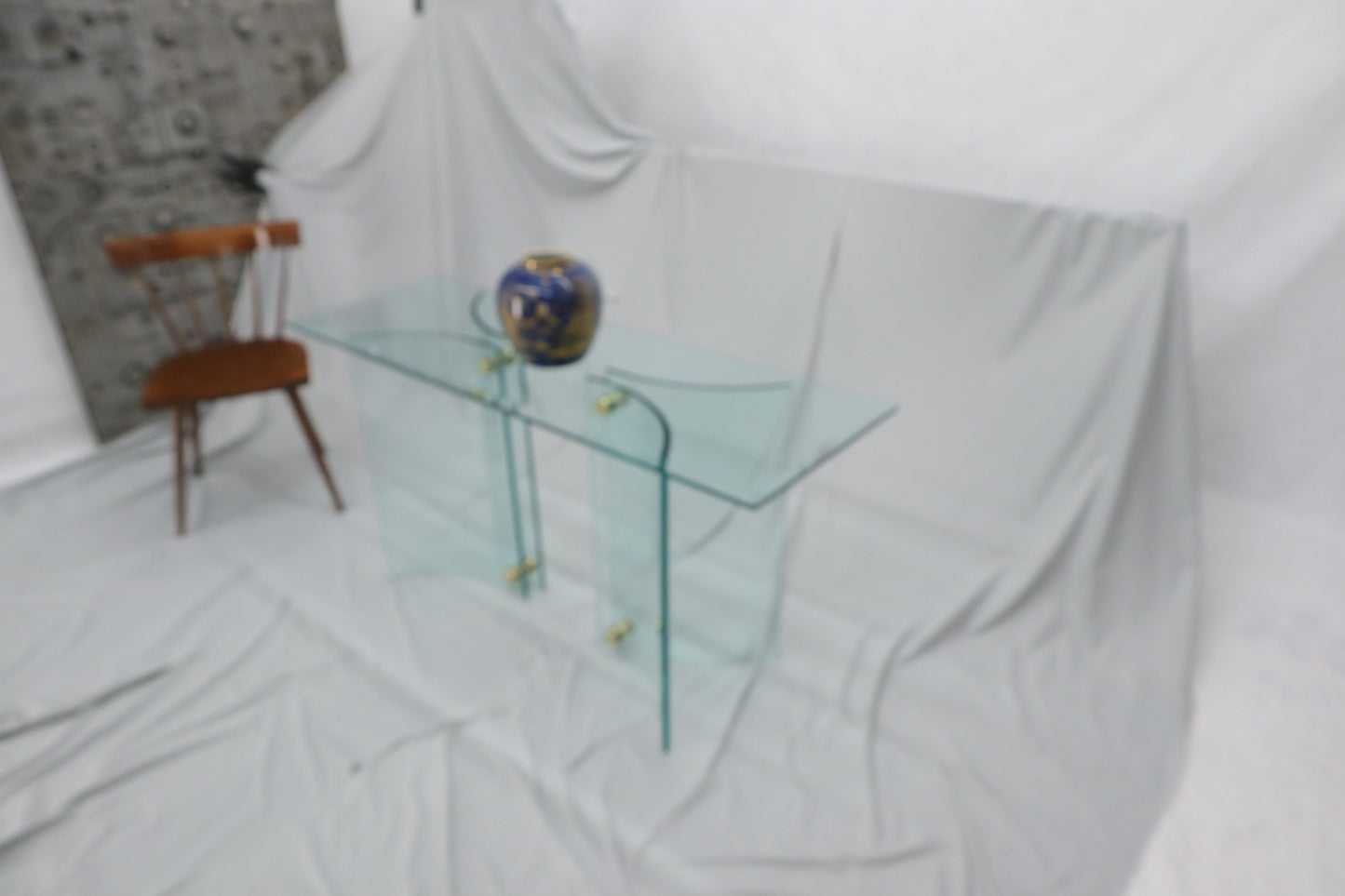 EstablishedLines Curved Glass Base Glass Top Brass Stretchers Console Table