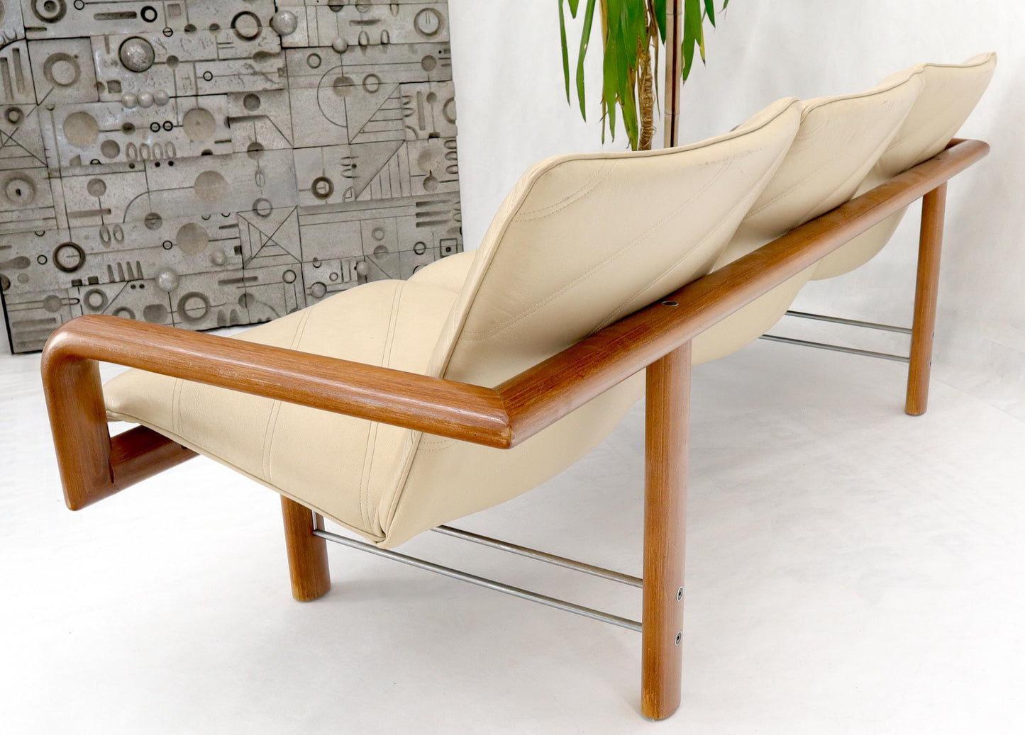 EstablishedLines Leather and Teak Midcentury Danish Modern Floating Sofa