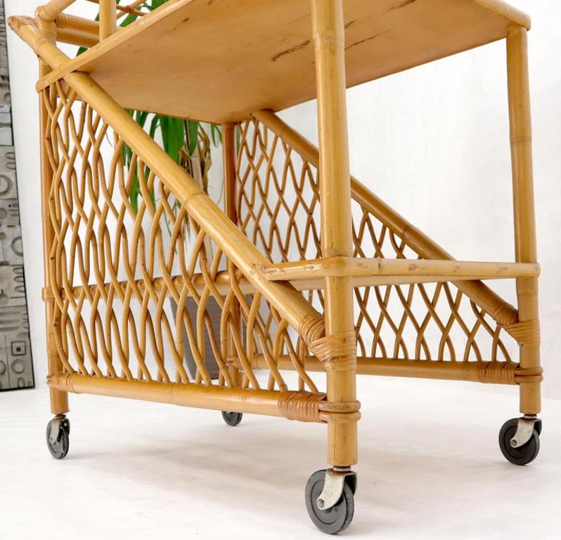 Mid century modern rattan and bamboo serving bar cart w/ bottles holder.