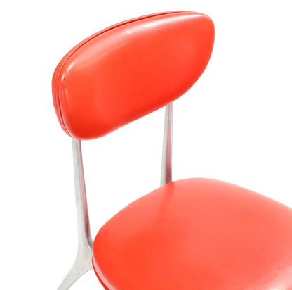 Pair of Red Vinyl Upholstery Cast Aluminum Sculptural Chairs