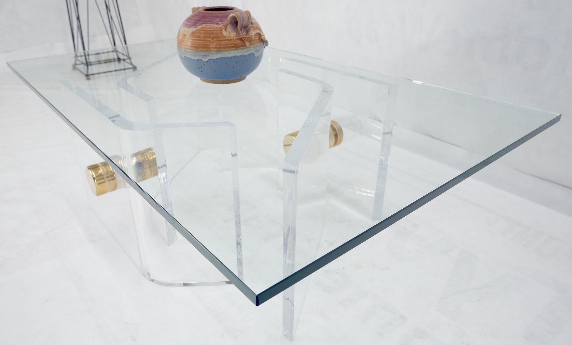 EstablishedLines Thick Bent Polished Lucite Gold Buttons Base Glass Top Mid Century Coffee Table