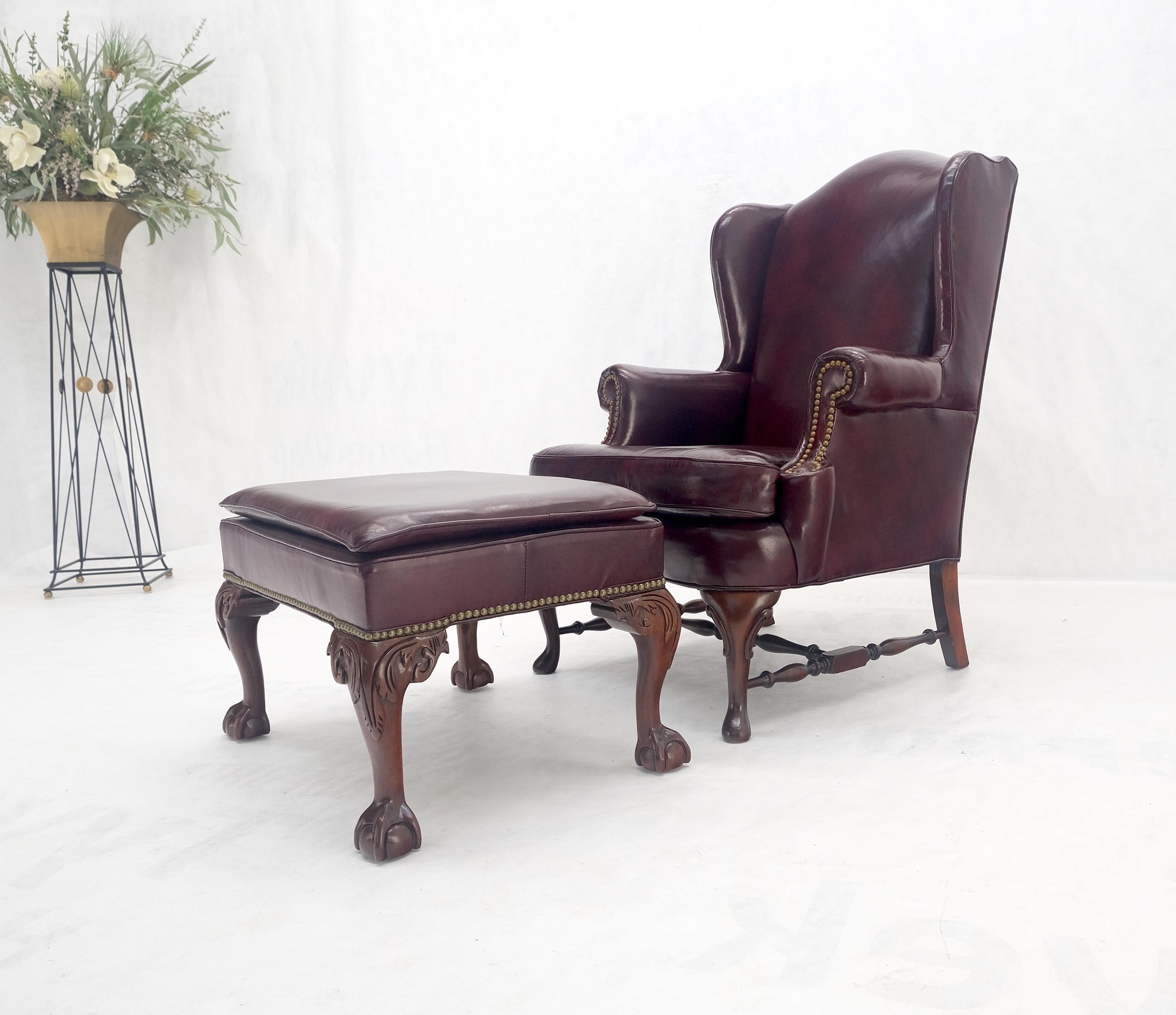 EstablishedLines Kindel Burgundy Leather Upholstery Carved Mahogany Legs Wingback Chair & Ottoman