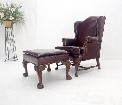 EstablishedLines Kindel Burgundy Leather Upholstery Carved Mahogany Legs Wingback Chair & Ottoman