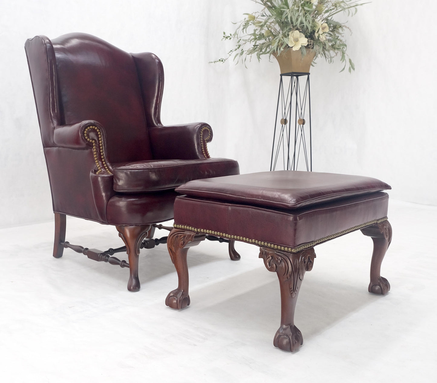 EstablishedLines Kindel Burgundy Leather Upholstery Carved Mahogany Legs Wingback Chair & Ottoman