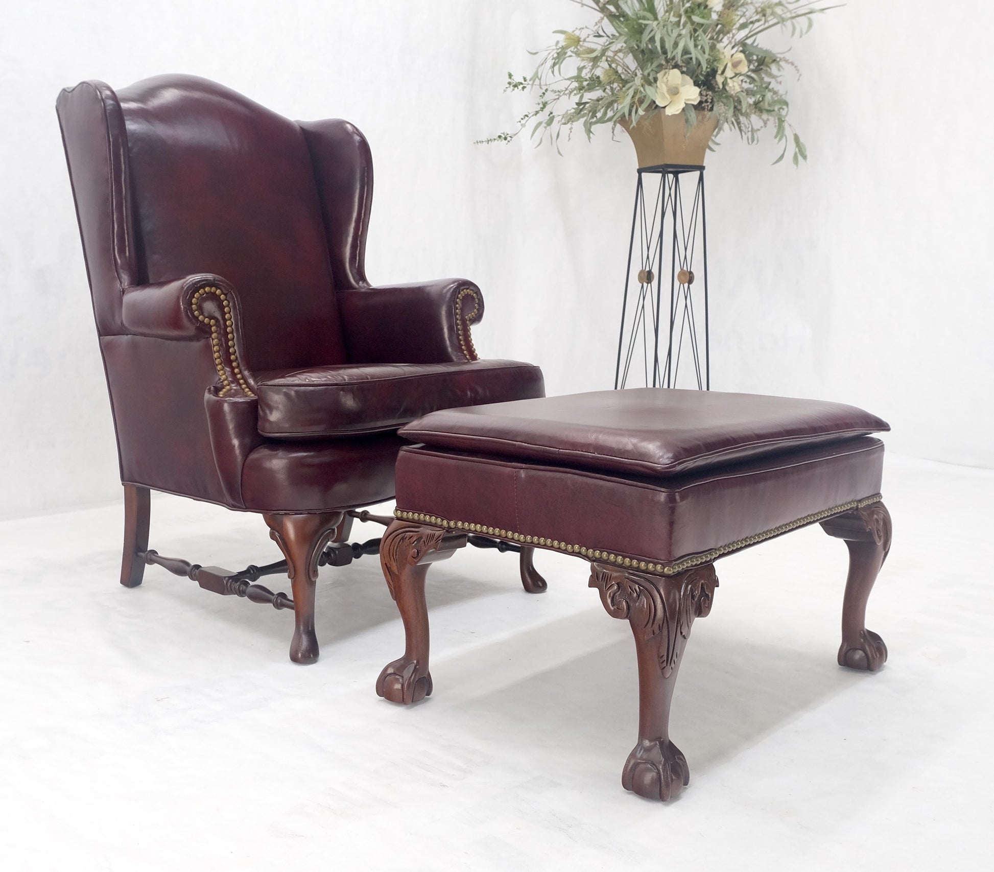 EstablishedLines Kindel Burgundy Leather Upholstery Carved Mahogany Legs Wingback Chair & Ottoman