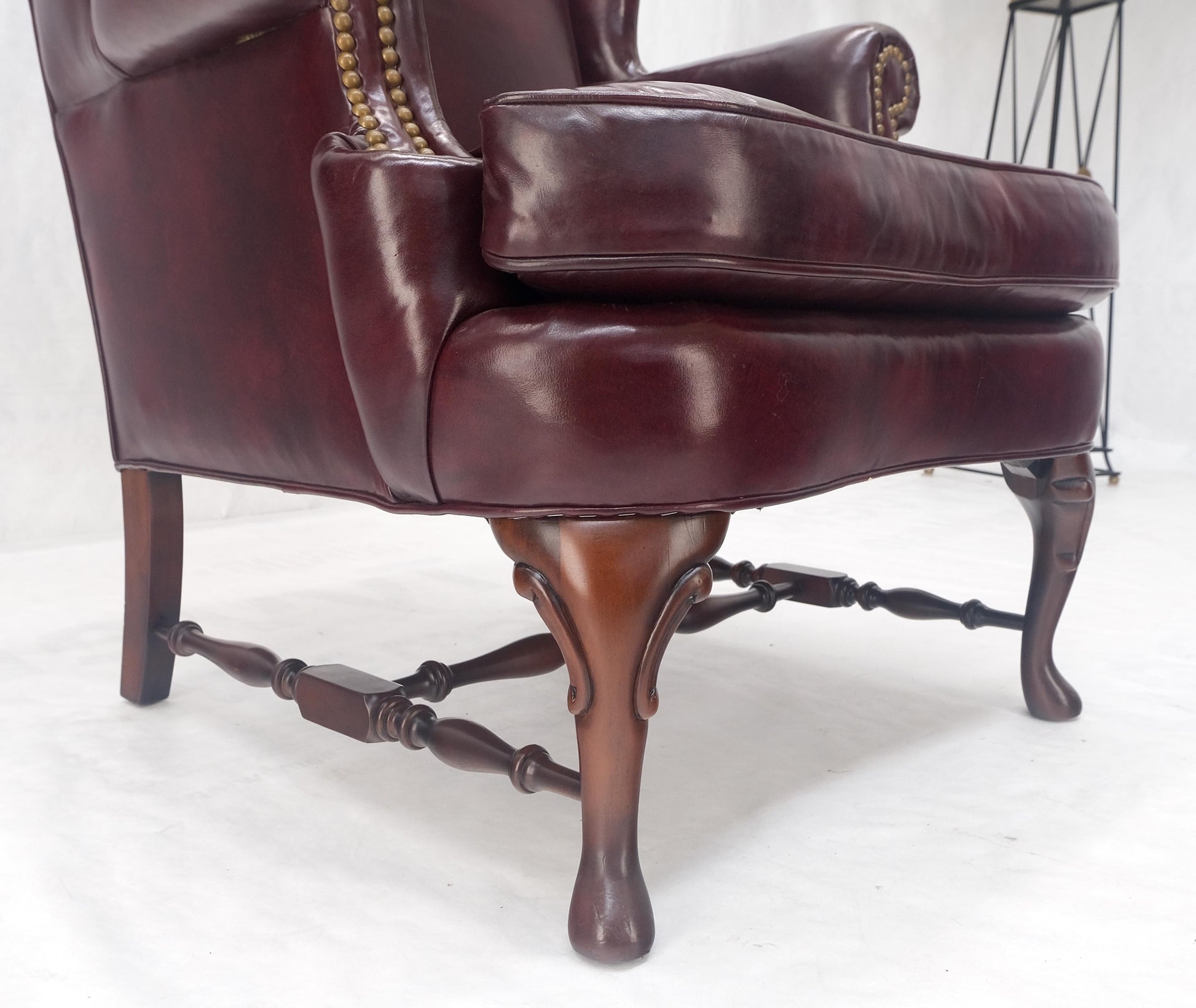 EstablishedLines Kindel Burgundy Leather Upholstery Carved Mahogany Legs Wingback Chair & Ottoman