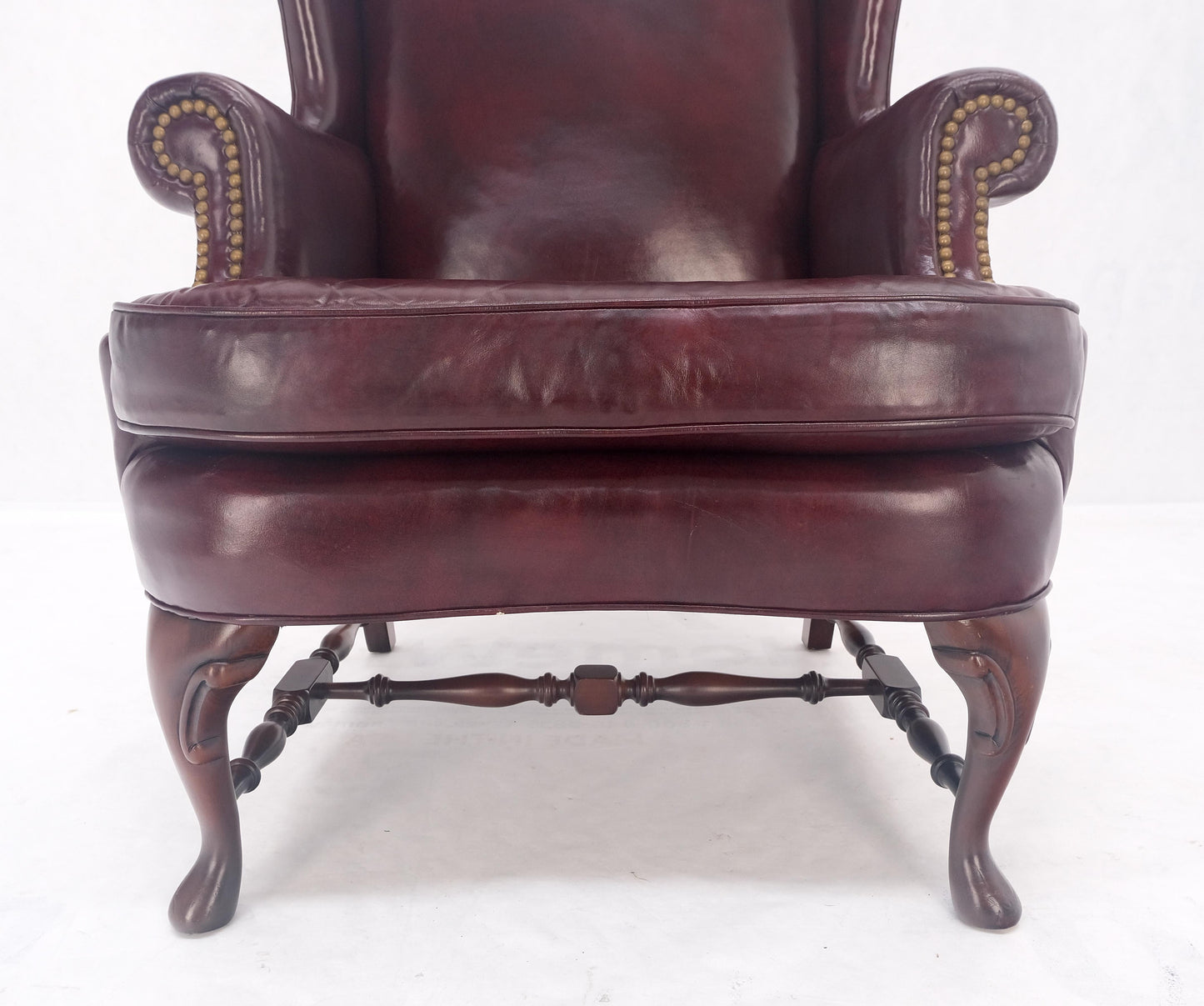 EstablishedLines Kindel Burgundy Leather Upholstery Carved Mahogany Legs Wingback Chair & Ottoman