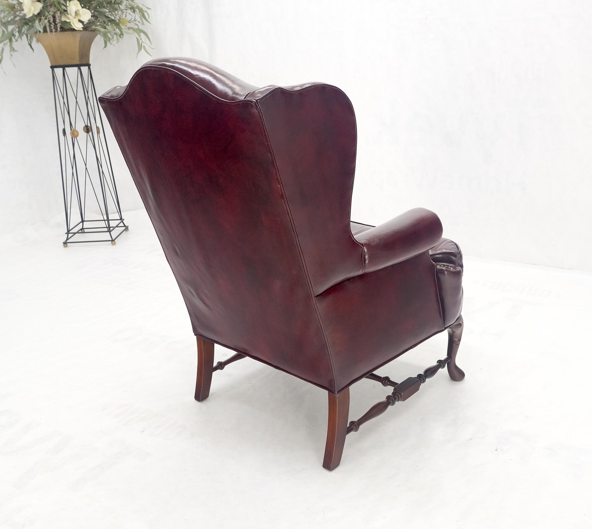 EstablishedLines Kindel Burgundy Leather Upholstery Carved Mahogany Legs Wingback Chair & Ottoman