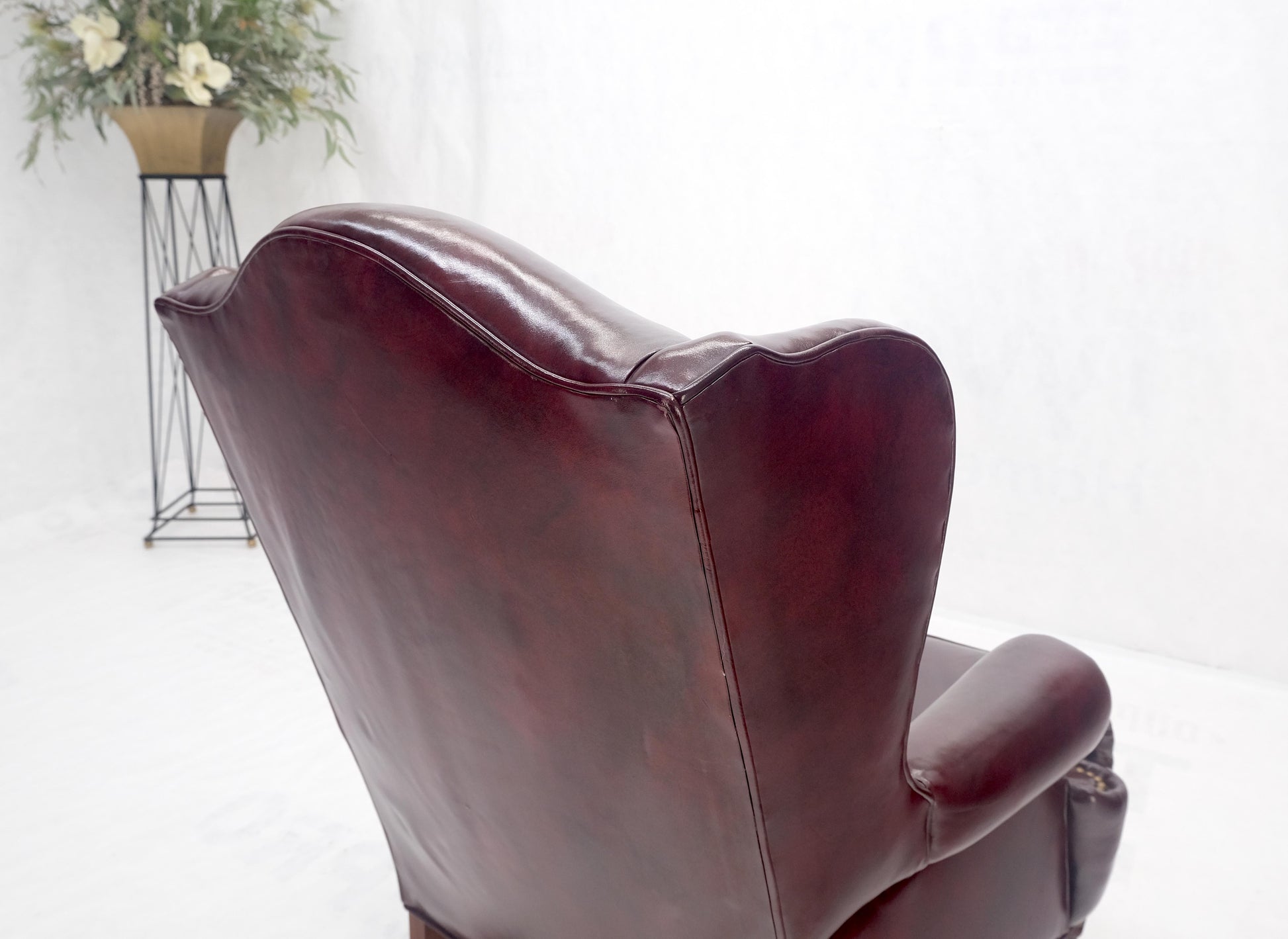 EstablishedLines Kindel Burgundy Leather Upholstery Carved Mahogany Legs Wingback Chair & Ottoman