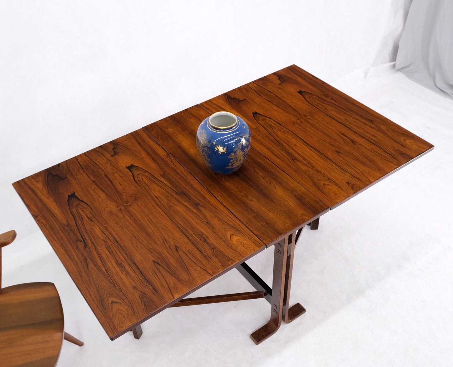 EstablishedLines Made in Norway Danish Modern Bent Rosewood Plywood Legs Drop Leaf Dining Table
