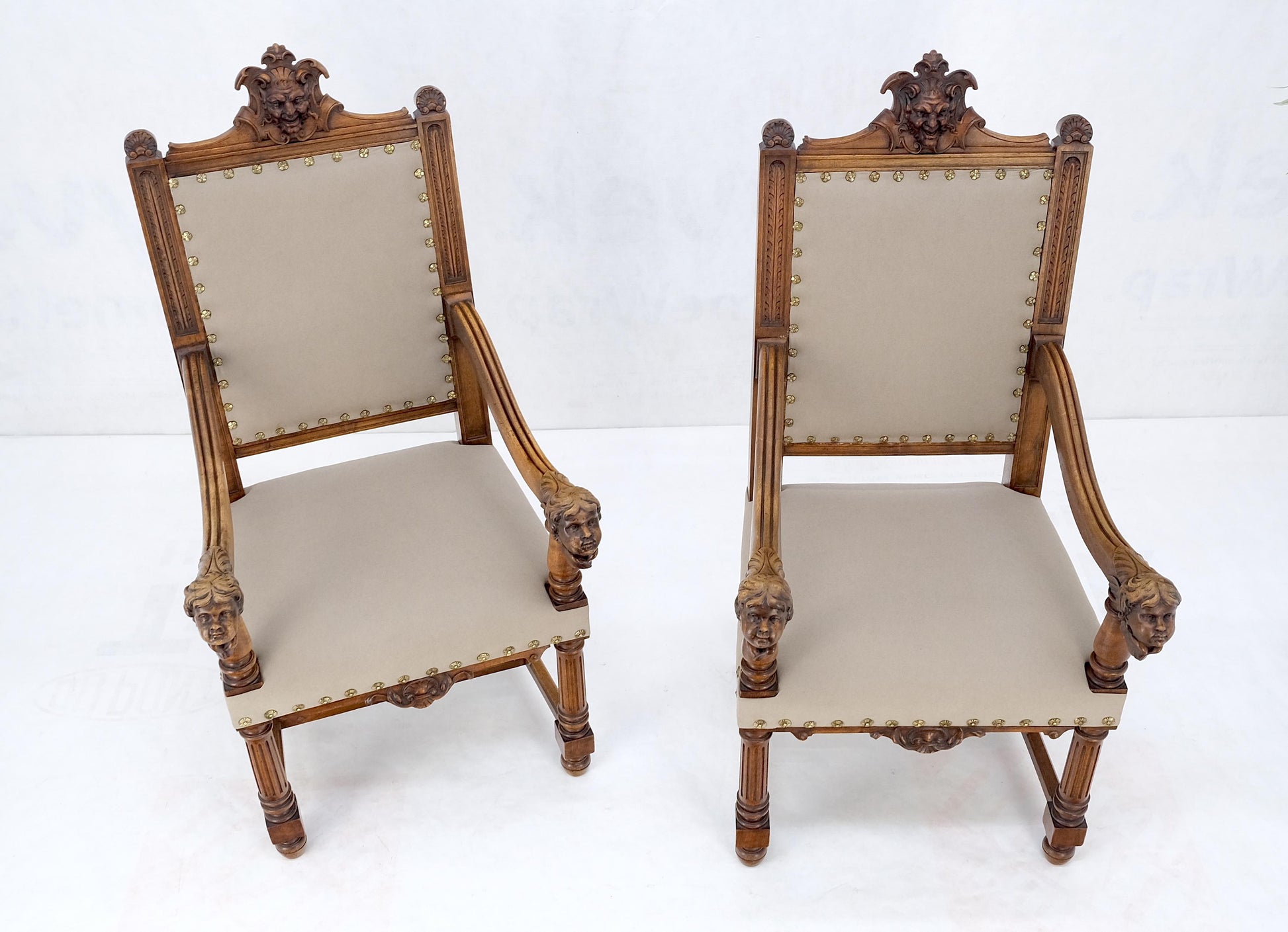EstablishedLines Pair Antique Heavily Carved Walnut Cherub North Wind Faces Arm Chairs New Uphols
