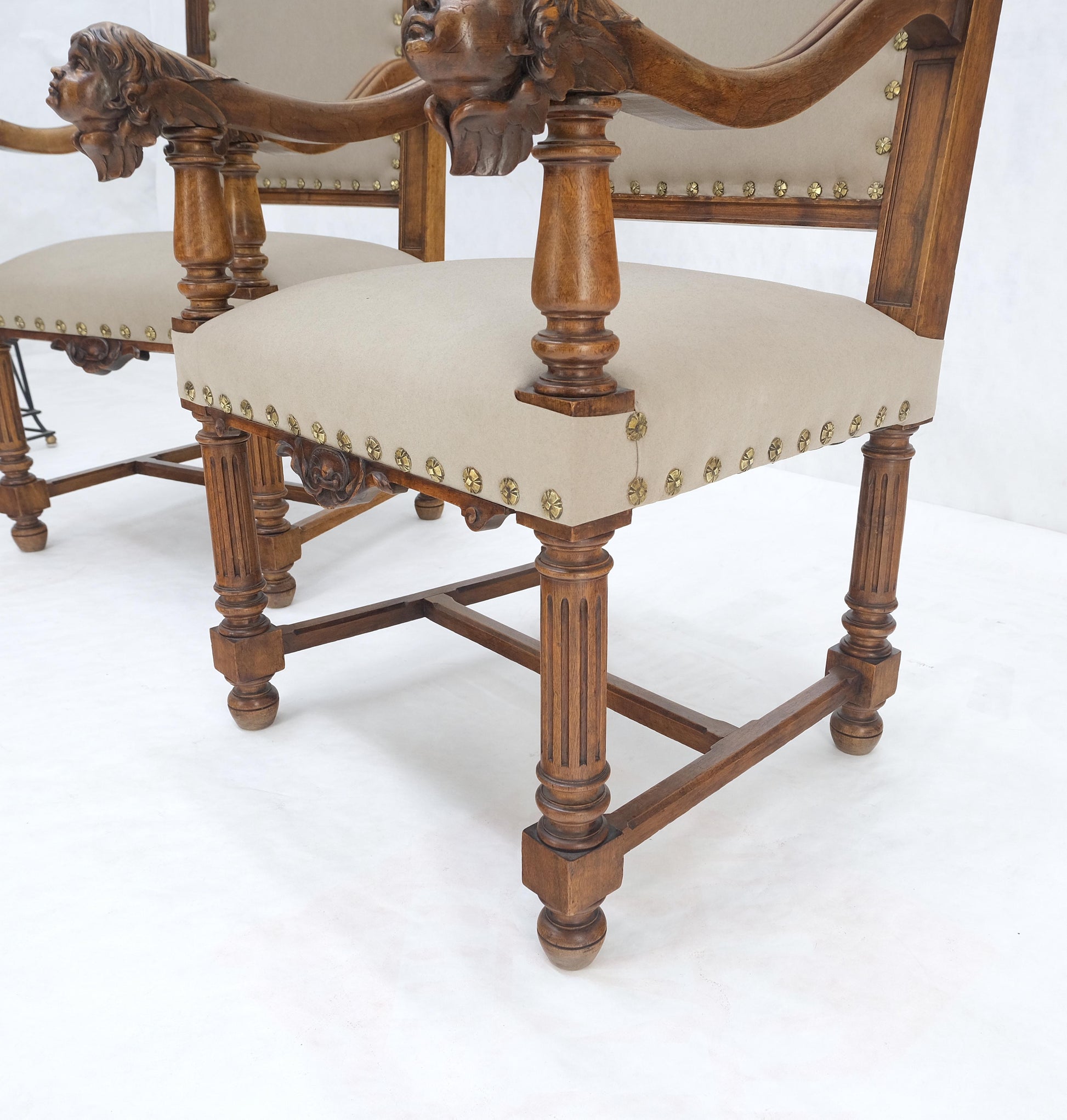 EstablishedLines Pair Antique Heavily Carved Walnut Cherub North Wind Faces Arm Chairs New Uphols