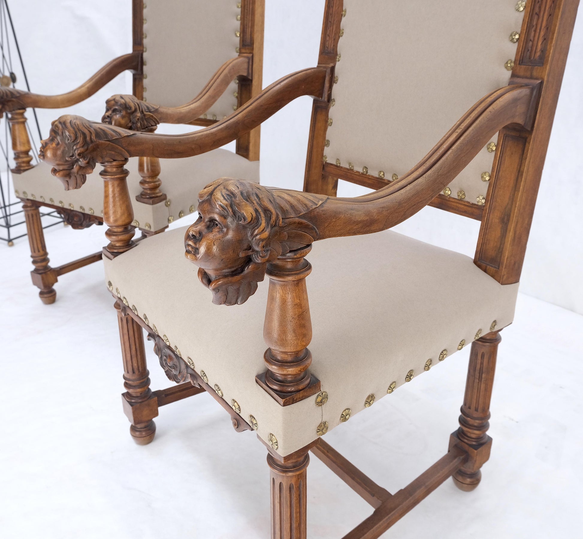 EstablishedLines Pair Antique Heavily Carved Walnut Cherub North Wind Faces Arm Chairs New Uphols