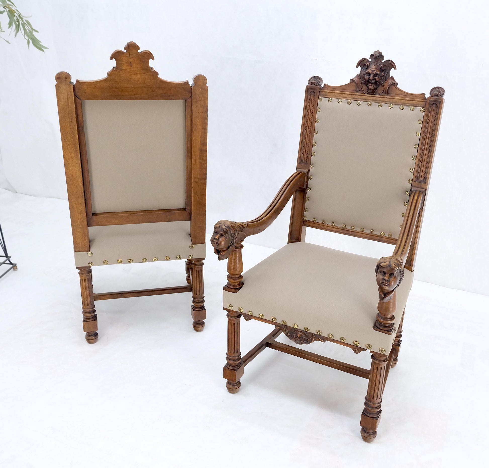EstablishedLines Pair Antique Heavily Carved Walnut Cherub North Wind Faces Arm Chairs New Uphols