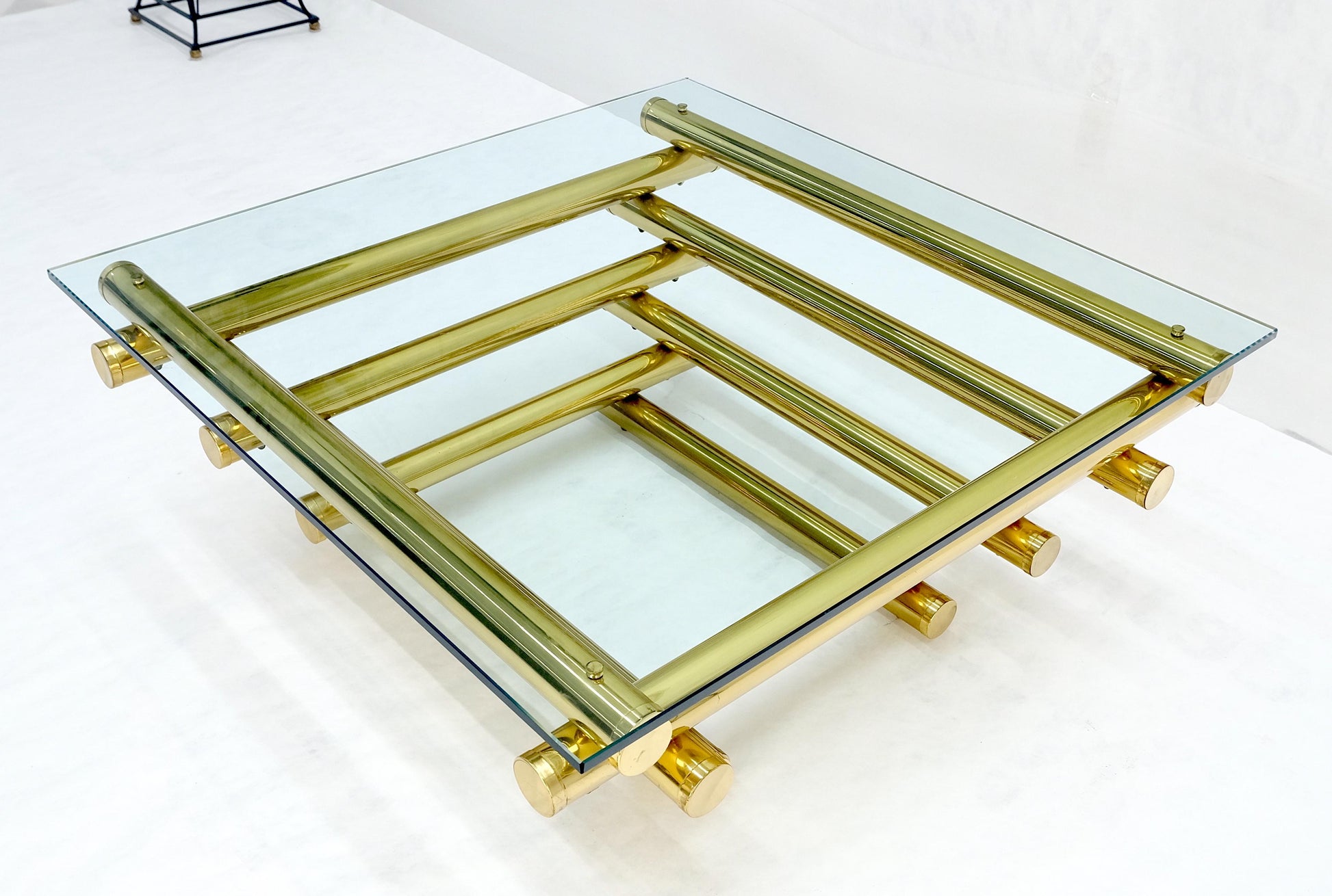 EstablishedLines Solid Brass Tube Segment Pyramid Shape Base 36" Square Glass Top Coffee Table