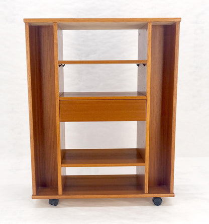 EstablishedLines Danish Mid Century Modern 1970s Teak Bookcase Entertainment Center on Wheels