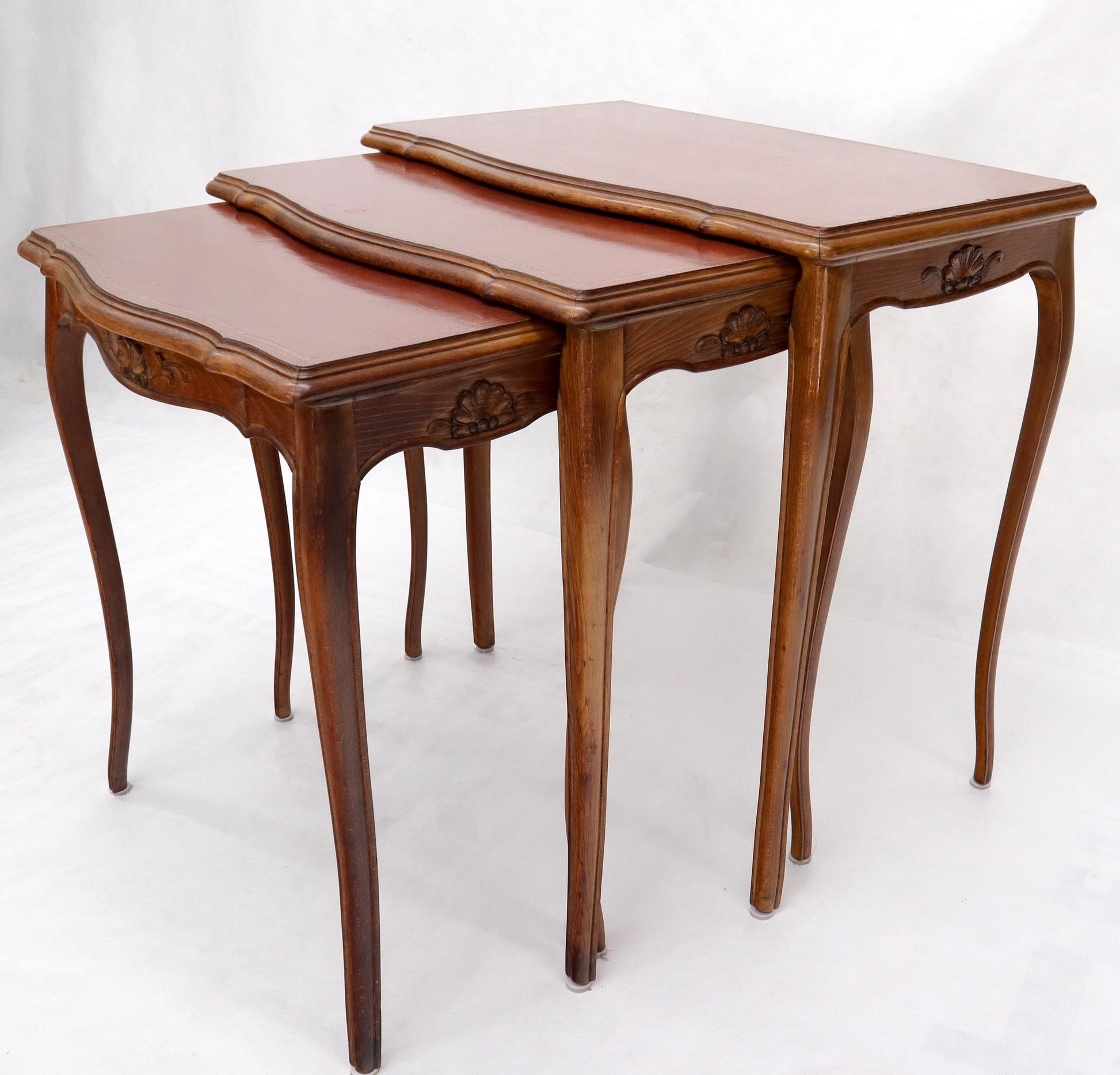 EstablishedLines Set of Rouge Tooled Leather Top Carved Walnut Cabriole Leg Set of Nesting Tables