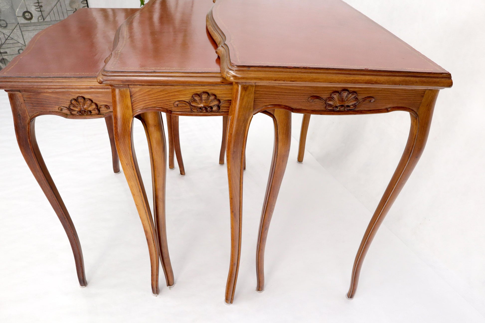 EstablishedLines Set of Rouge Tooled Leather Top Carved Walnut Cabriole Leg Set of Nesting Tables