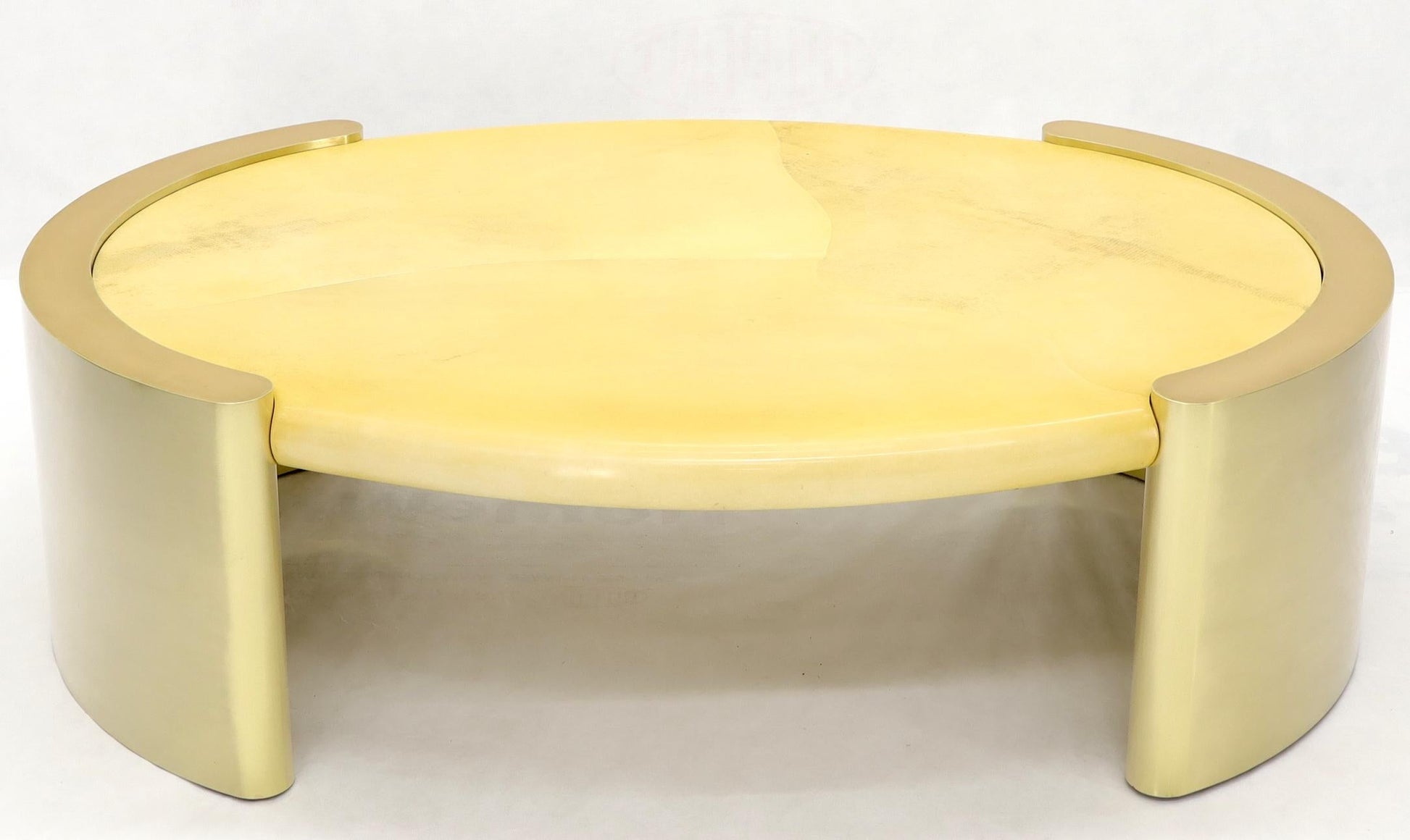 EstablishedLines Forged Rounded Brass Base Oval Goat Skin Top Mid-Century Modern Coffee Table