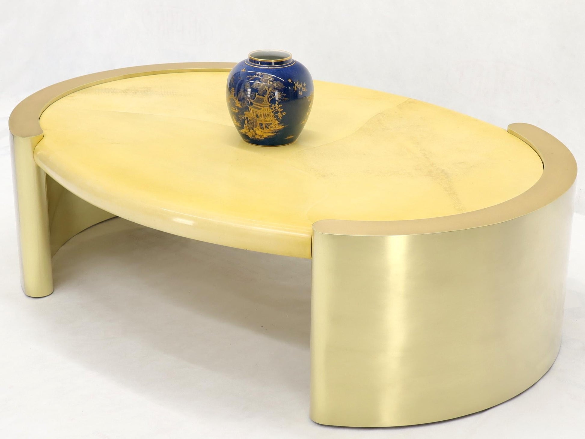 EstablishedLines Forged Rounded Brass Base Oval Goat Skin Top Mid-Century Modern Coffee Table